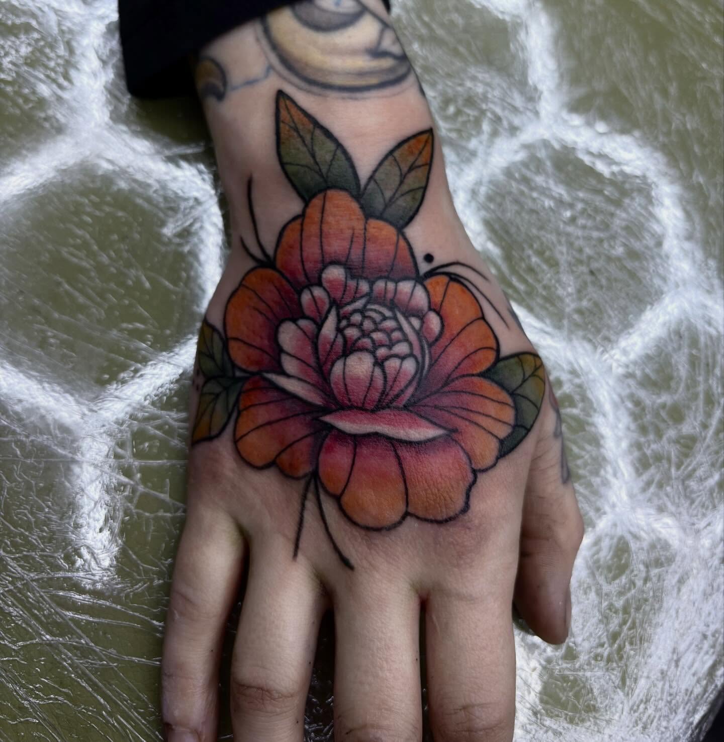 Flower American traditional tattoo on the hand by ππ©π’π΅ππ«π‘π―π ππ¬π«π’π°