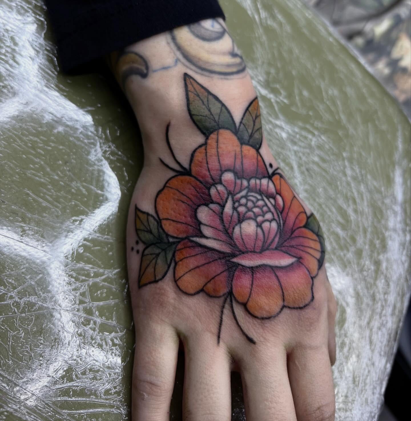 Peony flower American traditional tattoo on the hand by ππ©π’π΅ππ«π‘π―π ππ¬π«π’π°