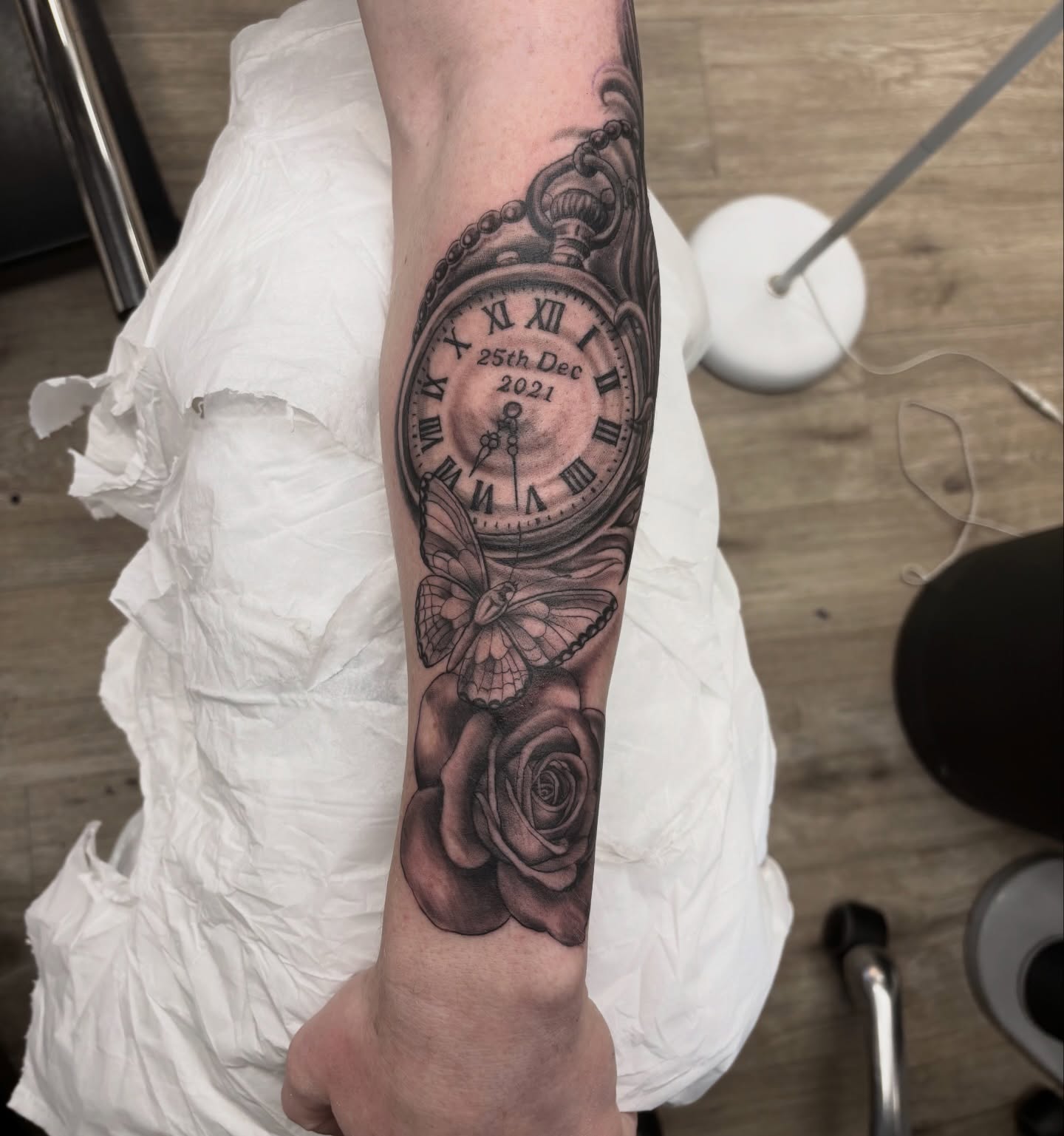 Clock and butterfly realism tattoo on the forearm by Ruth Ormsby-Ashworth
