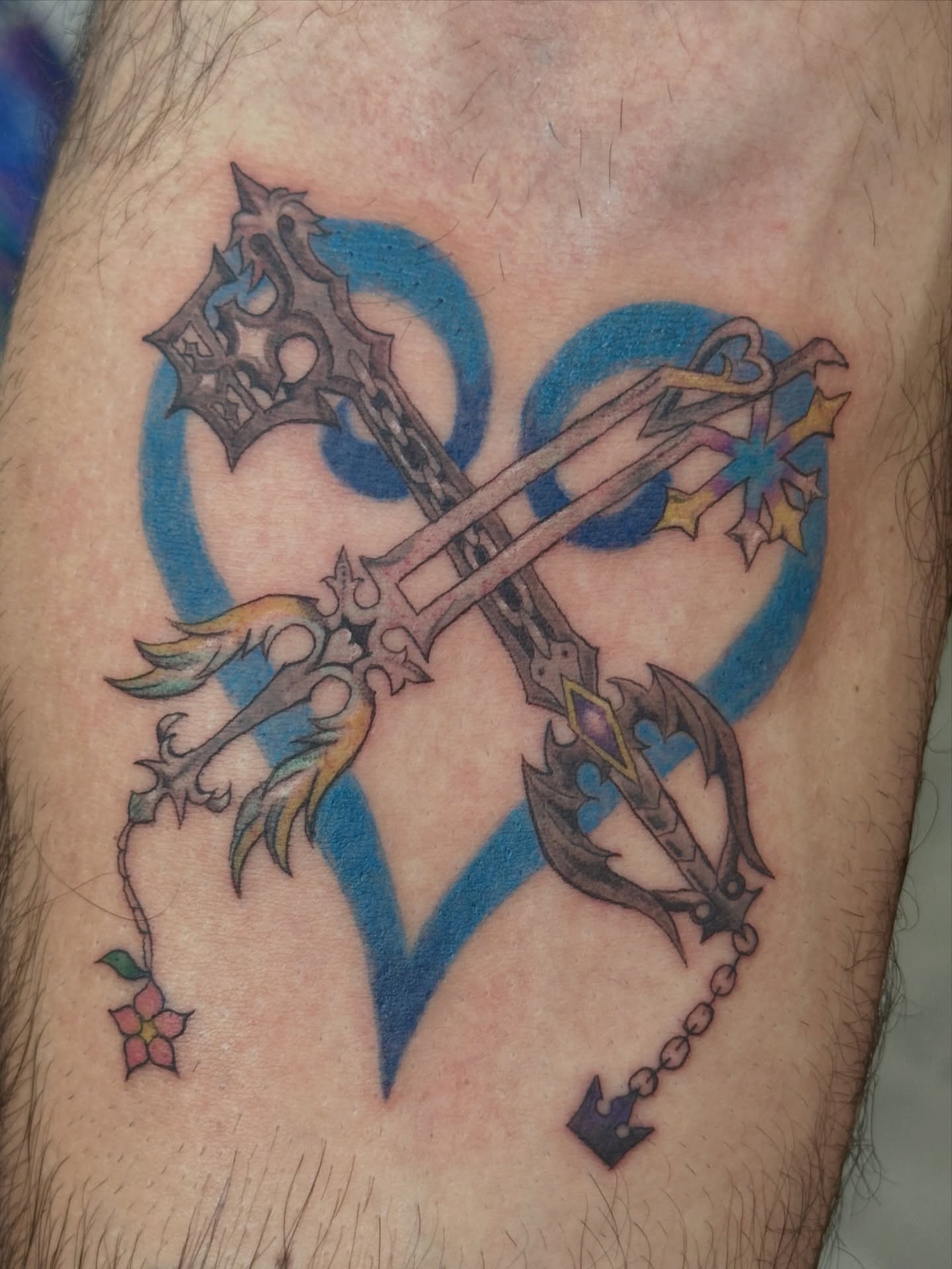Keyblade and heart new school tattoo on the leg by julian solis, Houston, Texas
