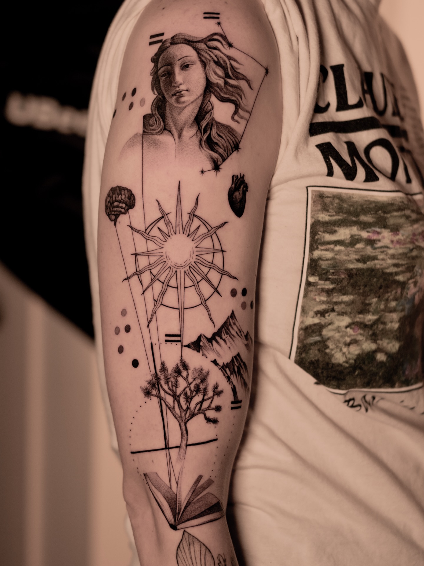 Astronomical symbols dotwork tattoo on the forearm by Mark D, Los Angeles, California