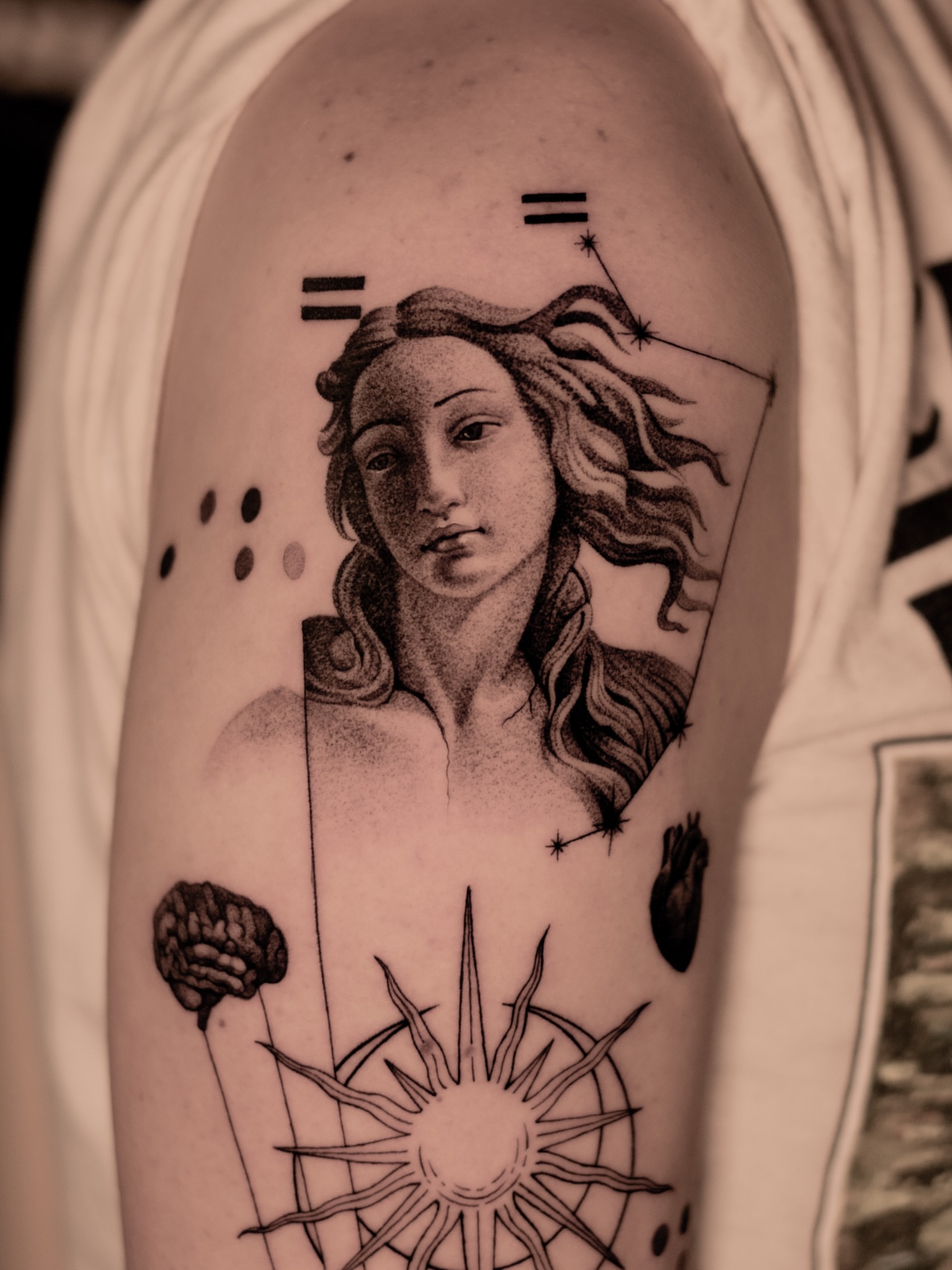 Woman with celestial elements dotwork tattoo on the forearm by Mark D, Los Angeles, California