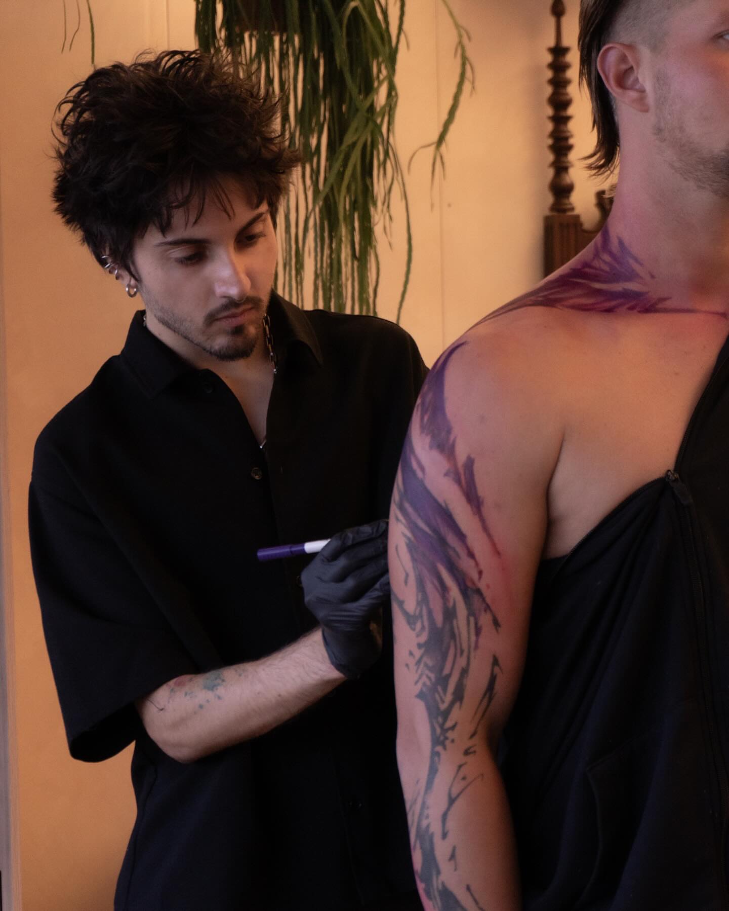 Flame black and grey tattoo on the shoulder by Pietro Moleti