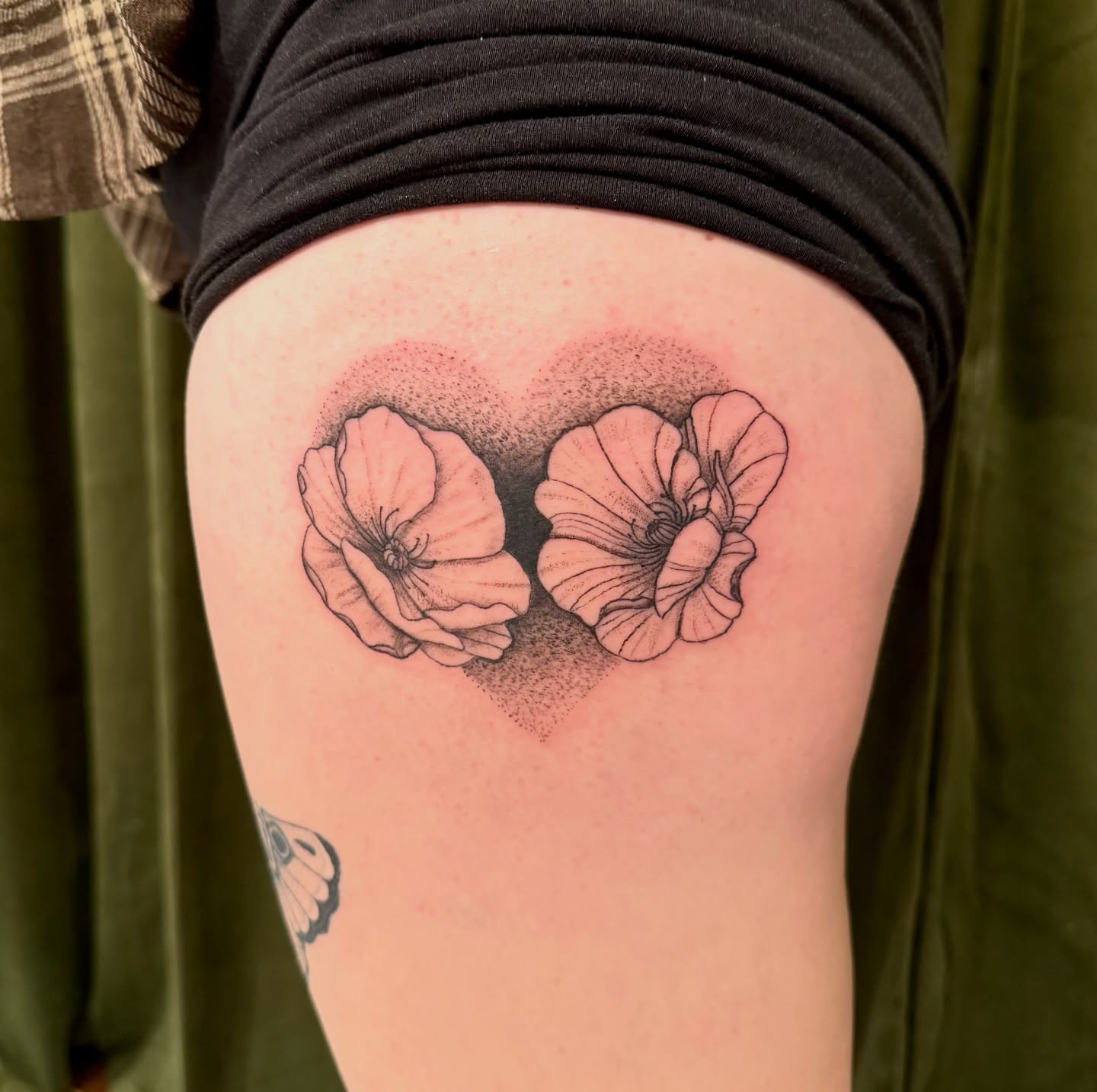 Poppy flowers dotwork tattoo on the thigh by Emily, Monticello, Iowa