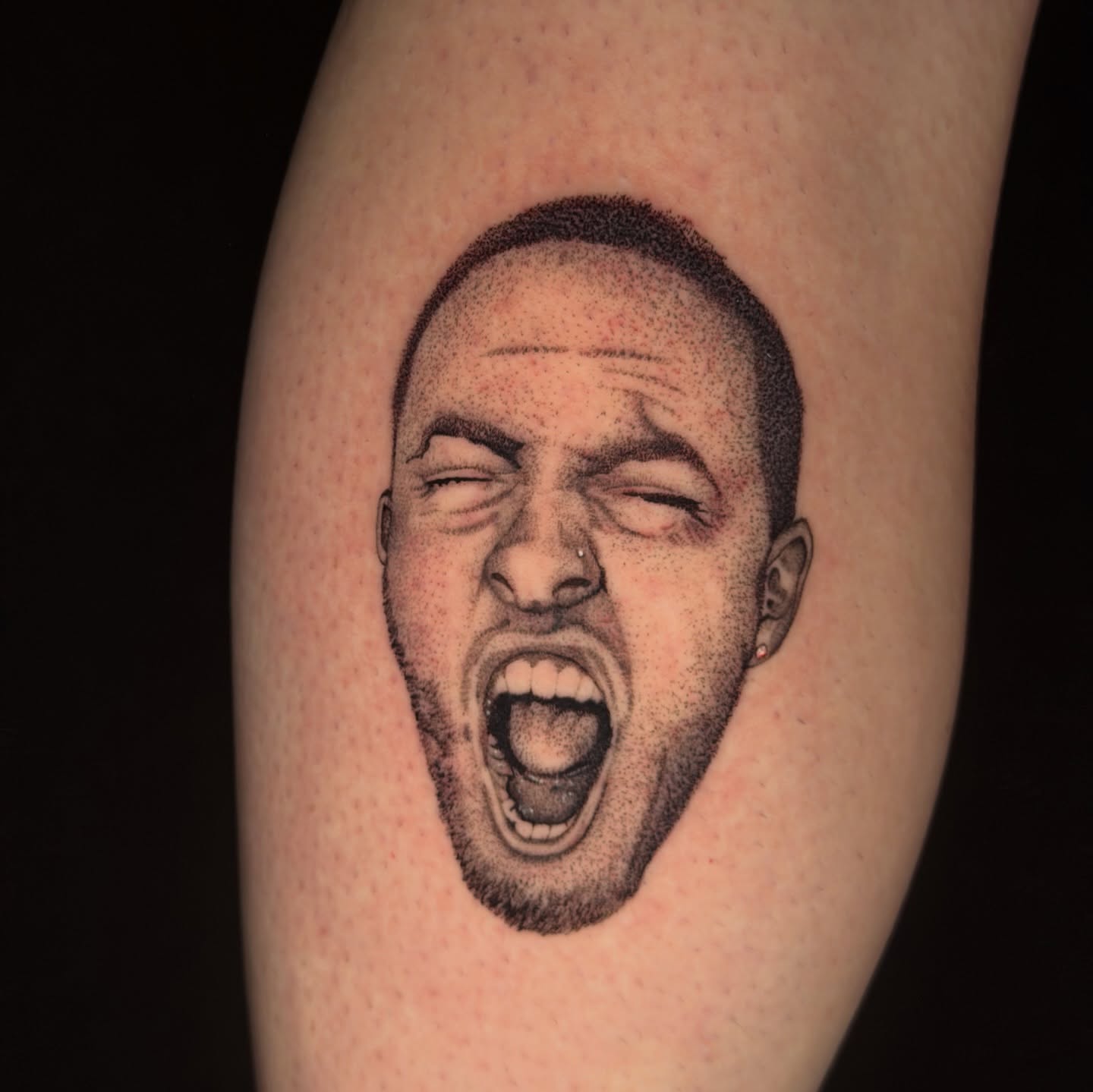 Yelling man dotwork tattoo on the forearm by Pedro Sinhorini, Portland, Oregon