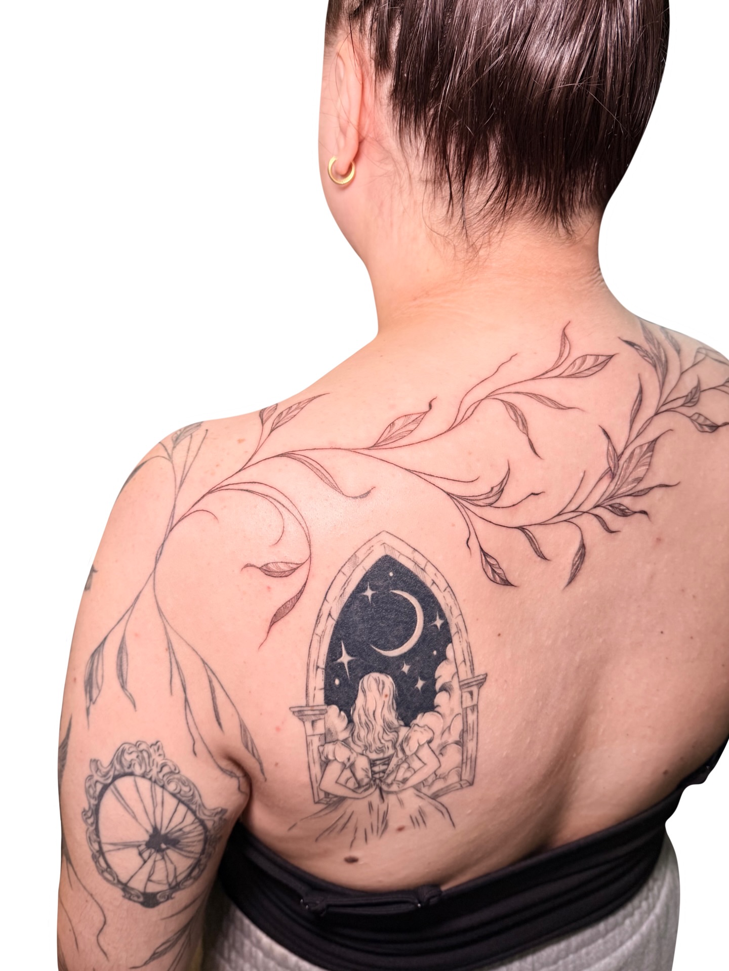 Window with celestial view realism tattoo on the back by Fionna, Seattle, Washington