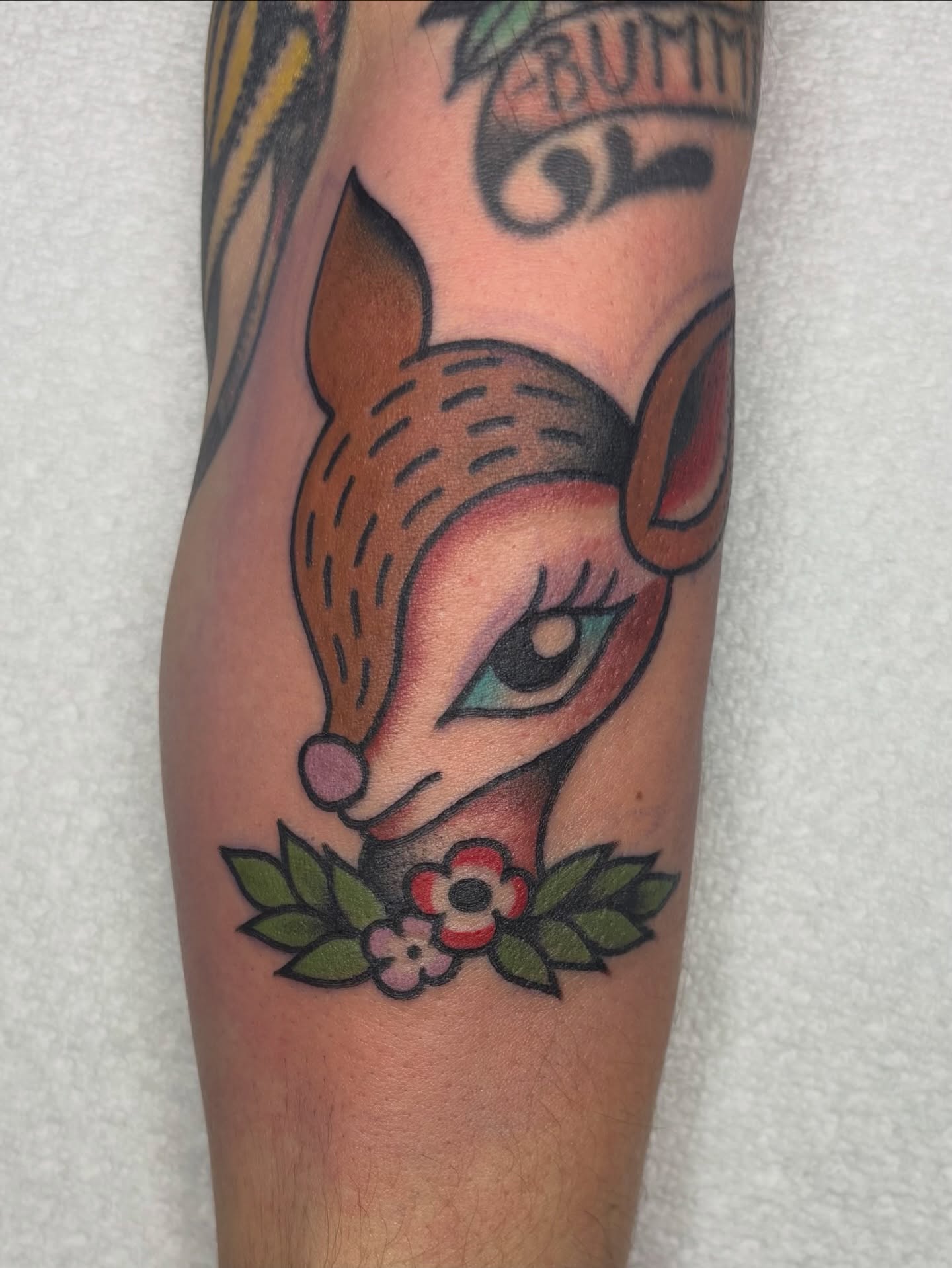 Deer head American traditional tattoo on the forearm by edith🌷, Murfreesboro, Tennessee