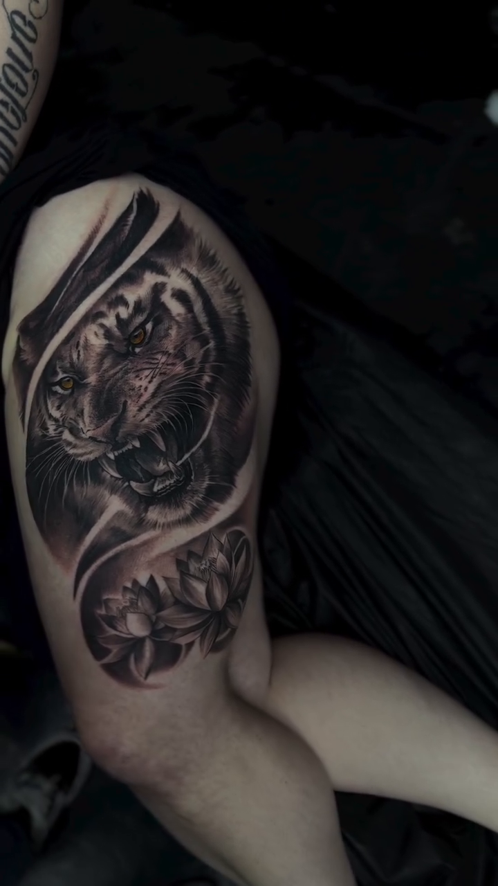 Tattoo by @tattoo_ravay — realism, black_and_grey