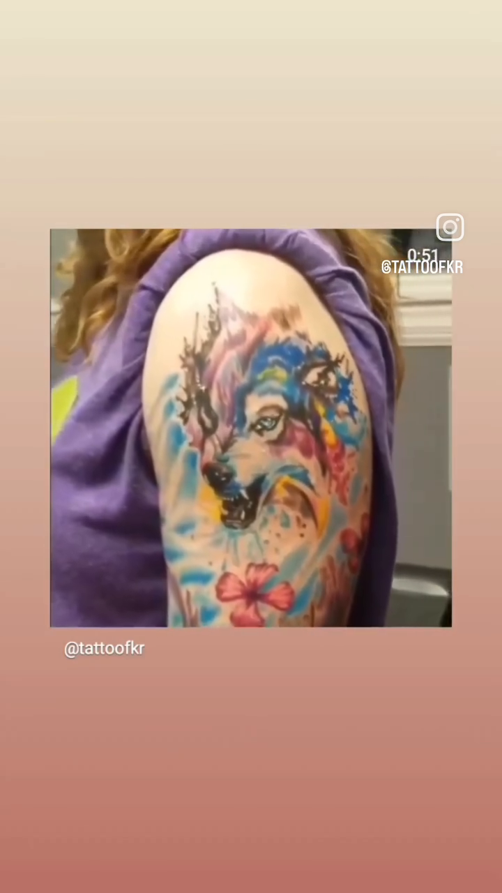 Wolf and floral sleeve tattoo on the shoulder by Jeff Frederick