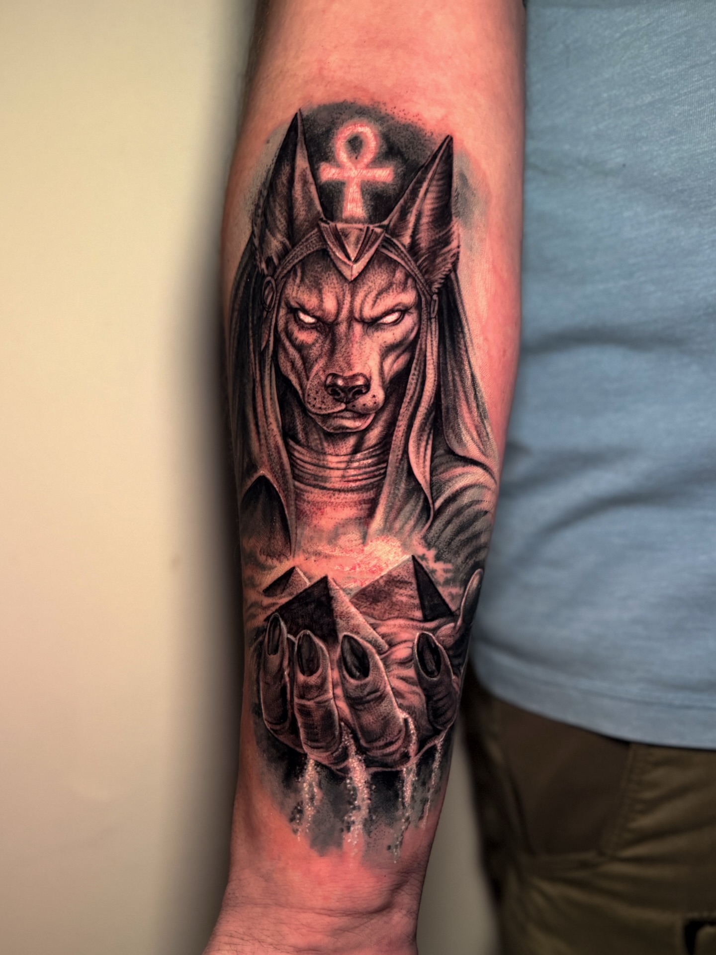 Demon-like figure dark realism tattoo on the forearm by Brandt Norcross