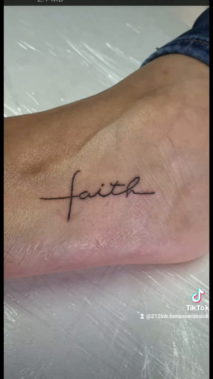 Faith lettering tattoo on the foot by Tatuajes Betto Ink Tattoo