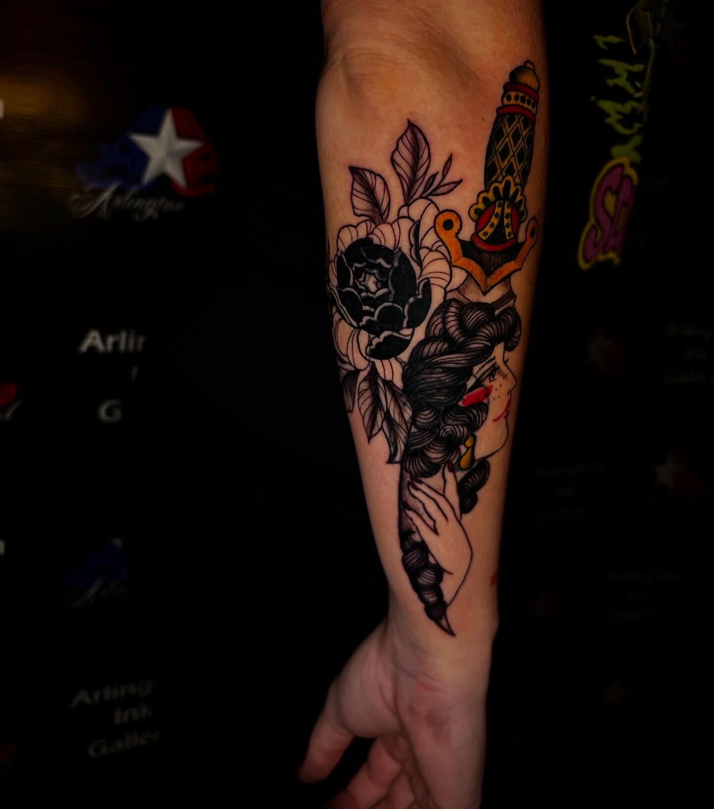 Woman with roses American traditional tattoo on the forearm by Haley Byers