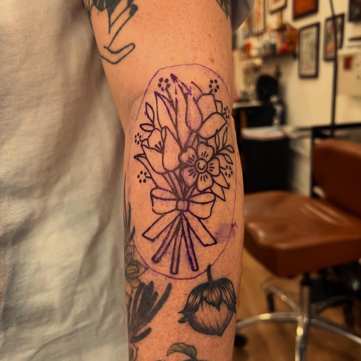 Flower bouquet black and grey tattoo on the forearm by Samantha Citer