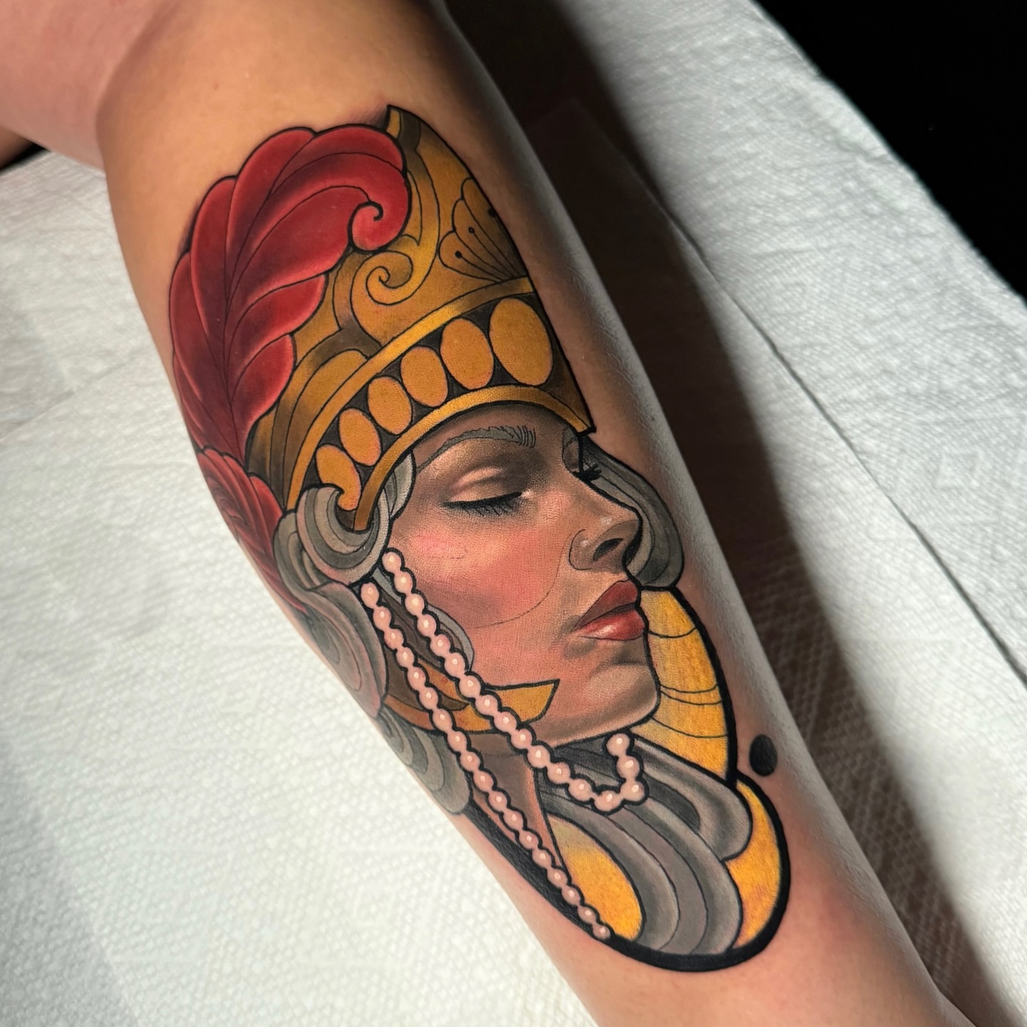 Woman wearing headdress American traditional tattoo on the forearm by ๐ ๐ต๐๐๐๐๐ ๐ฎ๐๐๐๐๐๐๐๐๐