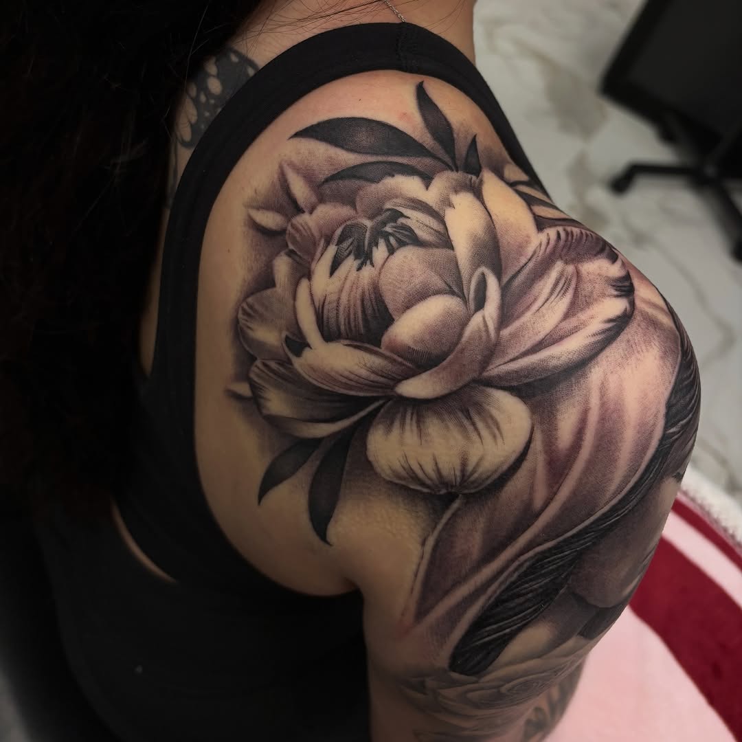 Tattoo by @tj_tattoos14 — realism, black_and_grey
