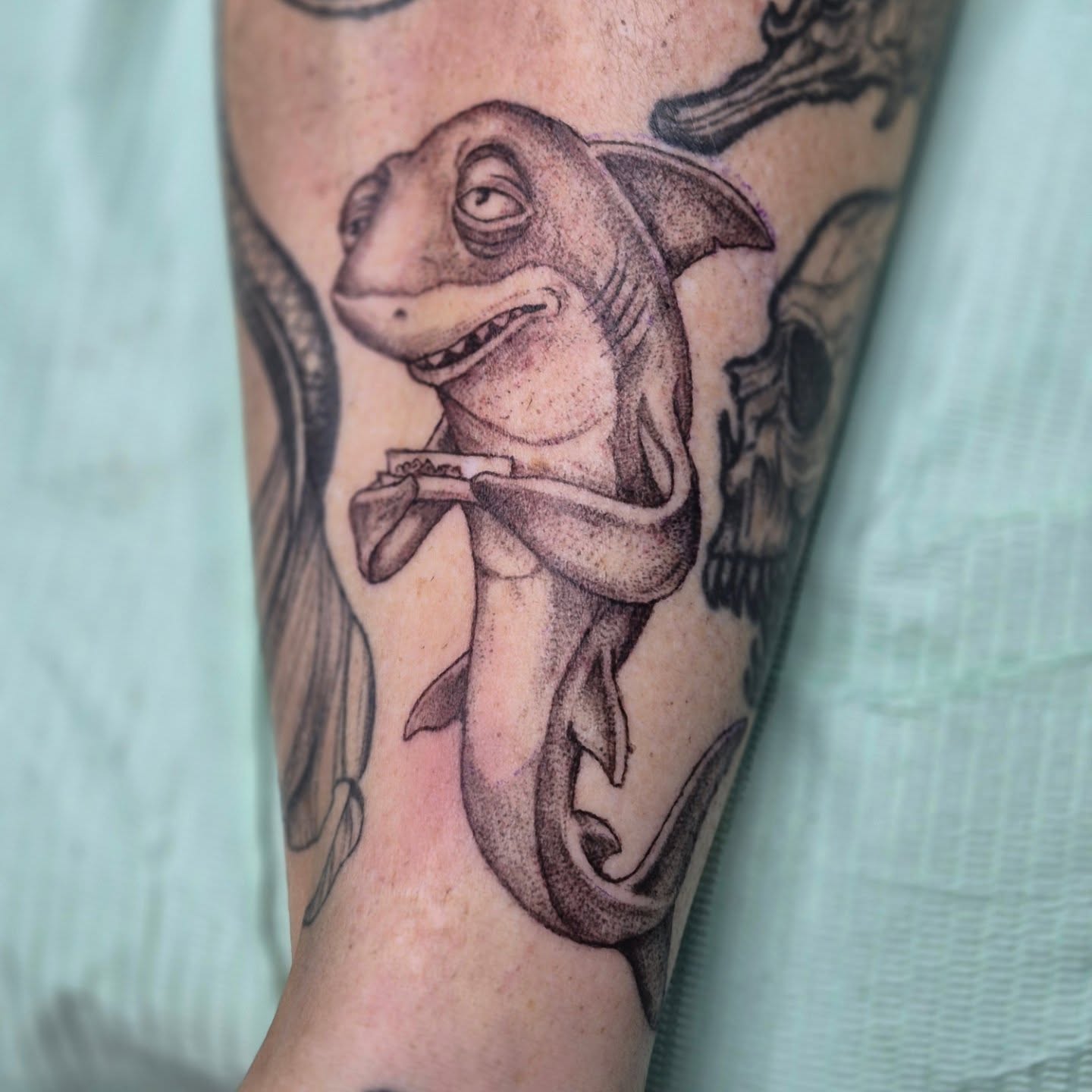 Shark dotwork tattoo on the forearm by Chris Bell
