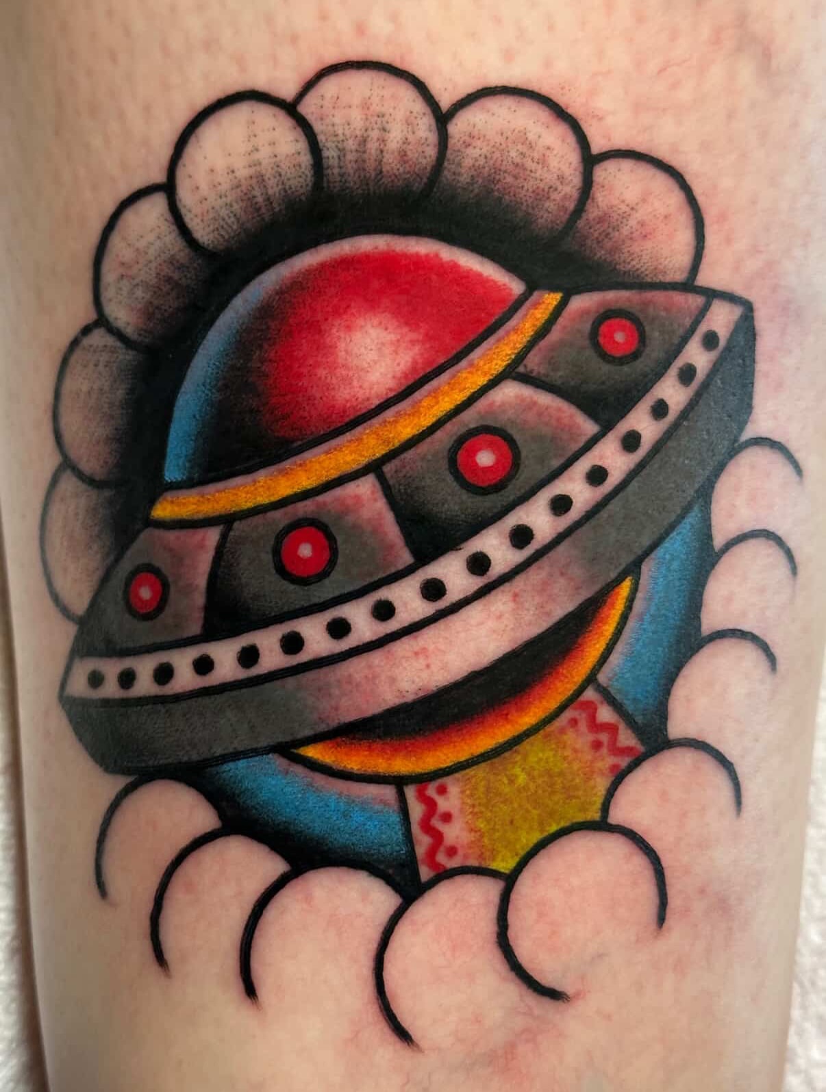 UFO American traditional tattoo on the forearm by Brandon Bear