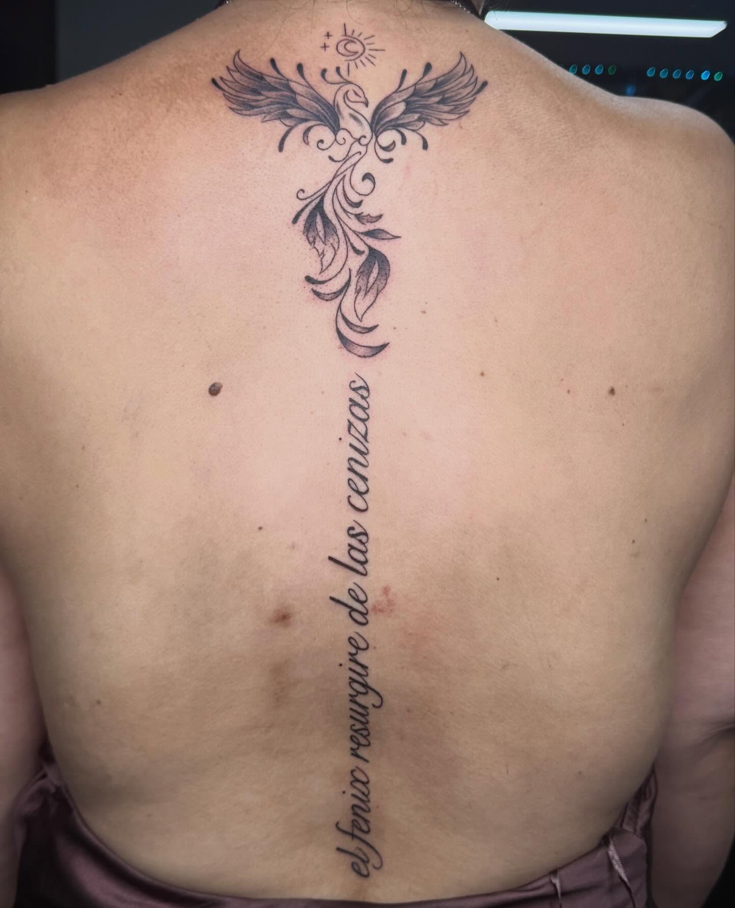 Phoenix ornamental tattoo on the back by Kimberly landin