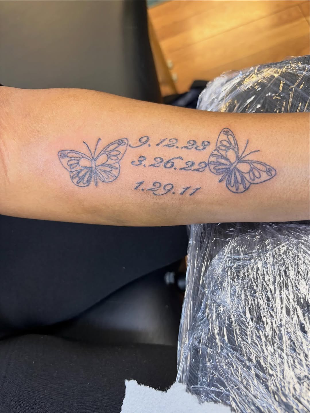 Butterflies and dates fine line tattoo on the forearm by Jae the artist🫡
