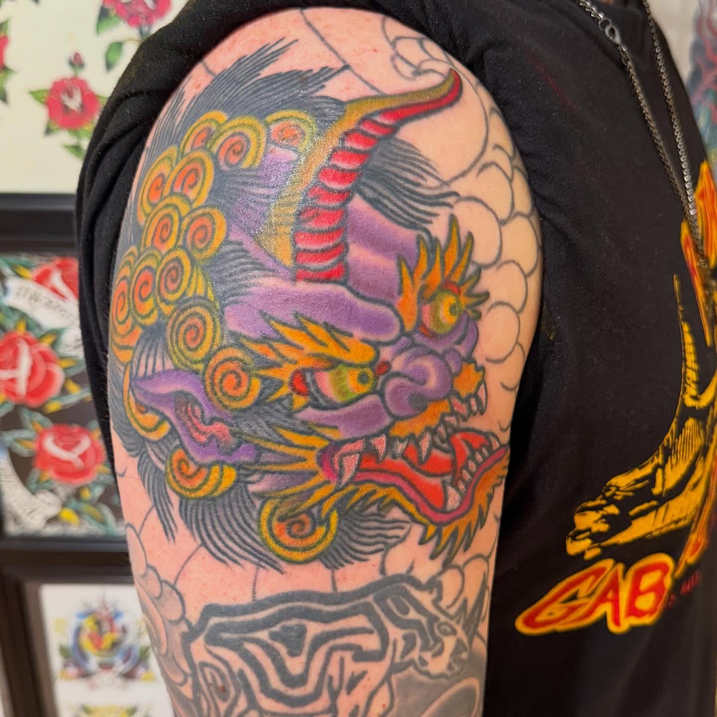 Dragon American traditional tattoo on the shoulder by Mike Kepper