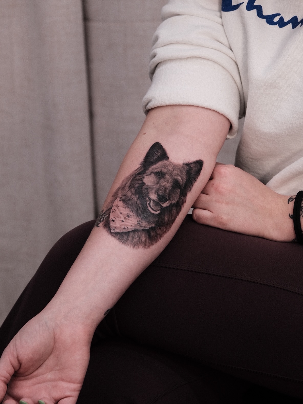 Dog realism tattoo on the forearm by Houston Tattoo Artist GoldenK