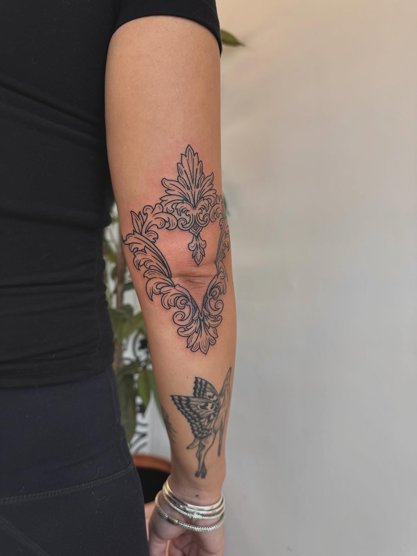 Floral ornament ornamental tattoo on the forearm by Stefany