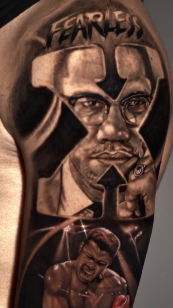 Muhammad Ali portrait realism tattoo on the upper arm by Baxtertattoo