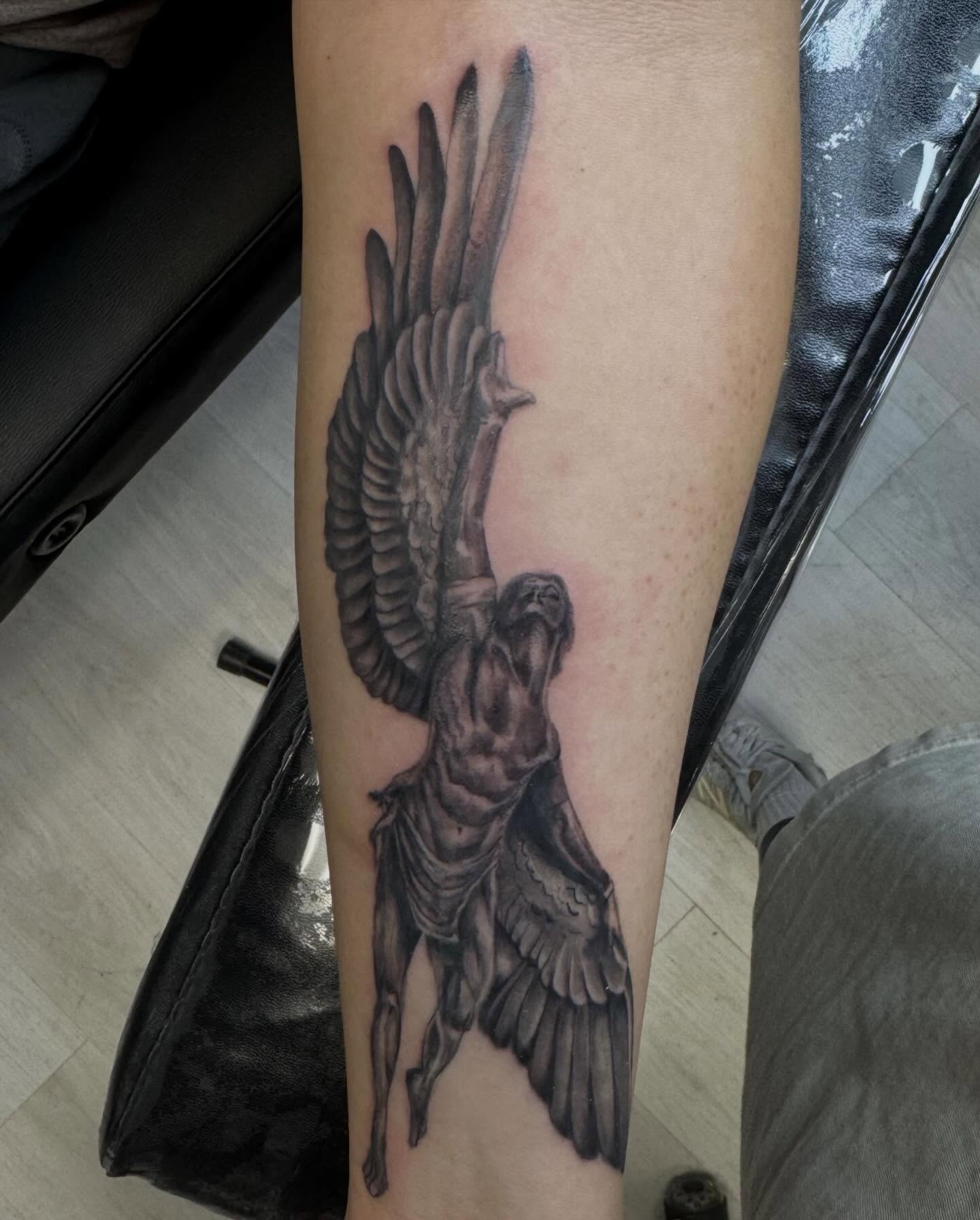 Angel realism tattoo on the forearm by Gigi