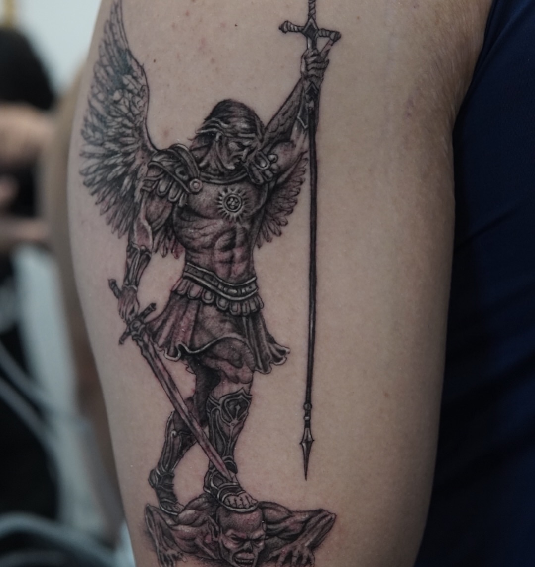 Angelic warrior realism tattoo on the forearm by Sebastian