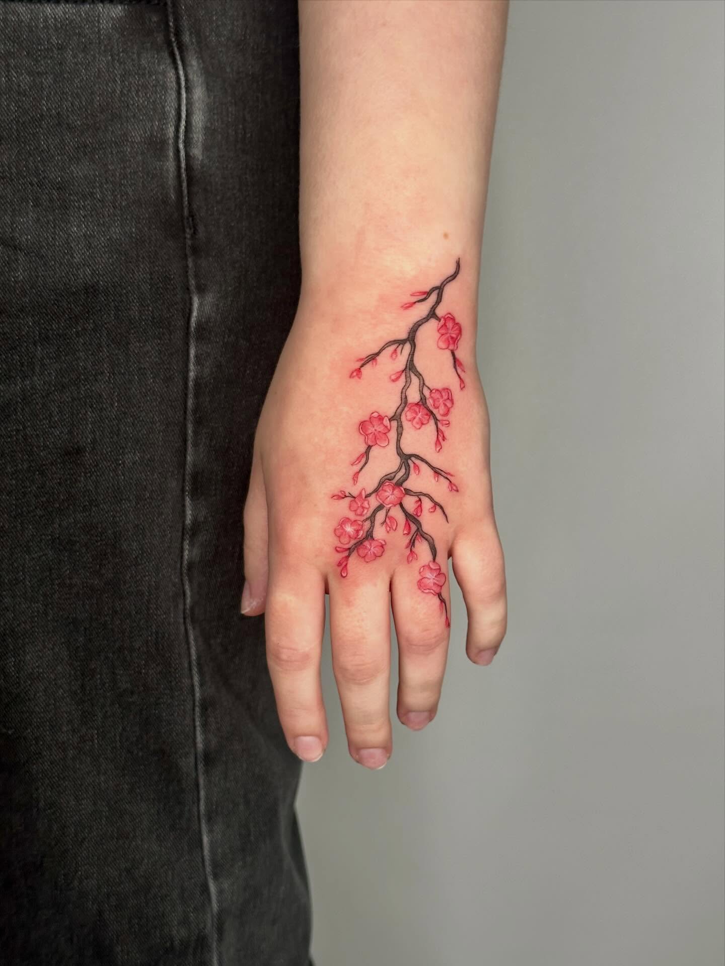 Cherry blossom branch dotwork tattoo on the hand by 🌼Kristen Kooster Tattoos🌼