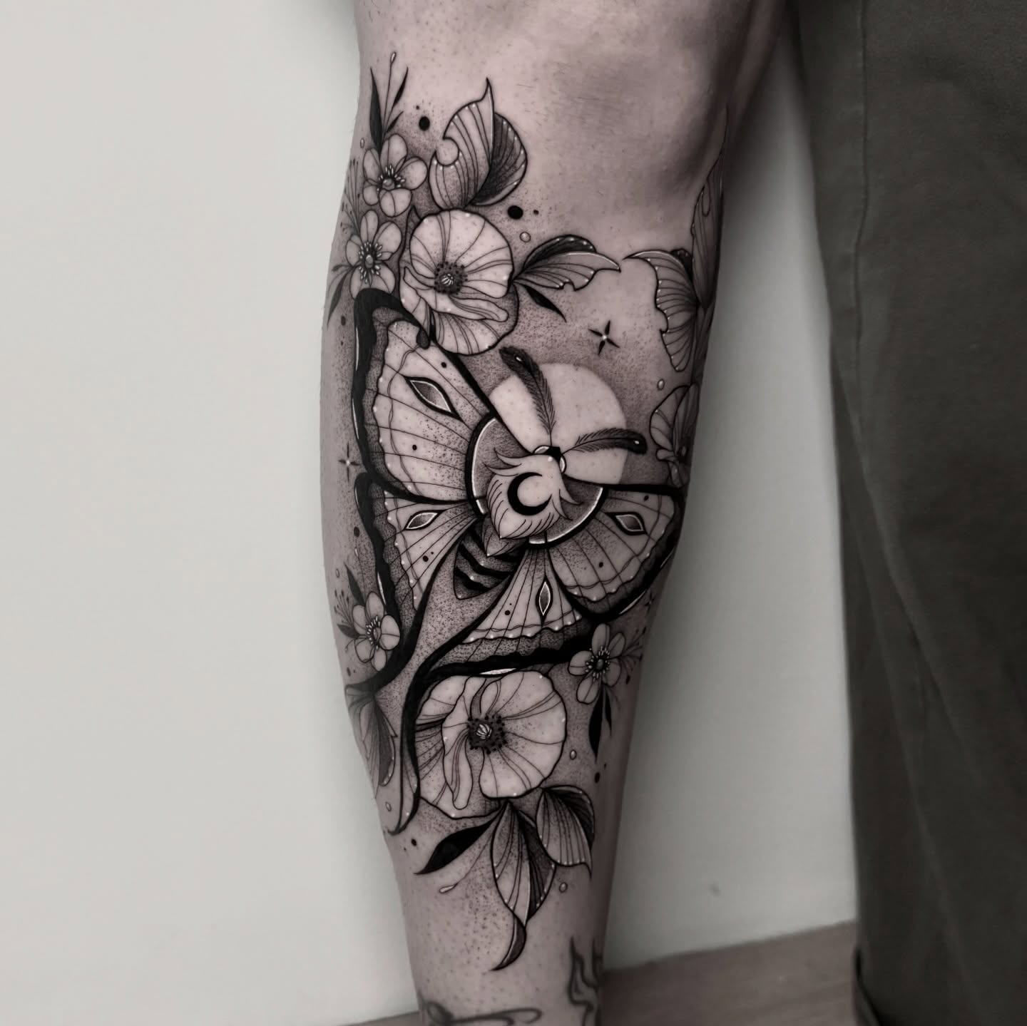 Butterfly and flowers dotwork tattoo on the forearm by ɪᴠᴏɴɴᴇ