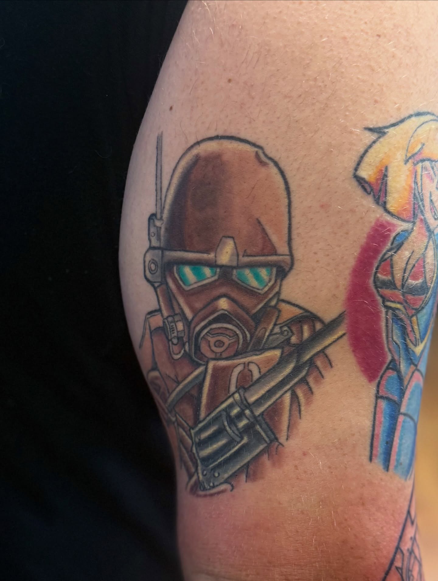 Mecha soldier realism tattoo on the upper arm by joshua sides