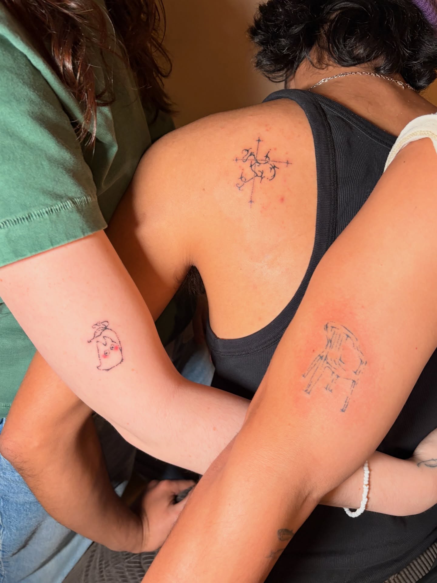 Animal geometric tattoo on the upper arm by ana