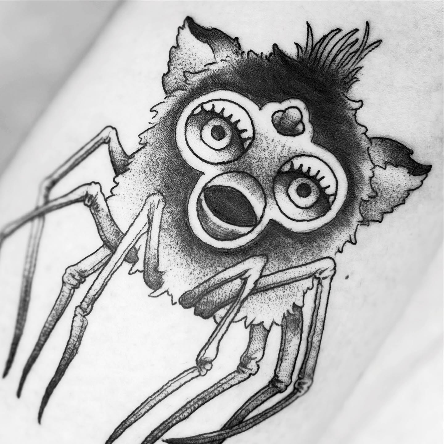 Spider dotwork tattoo on the forearm by Alex Santaloci