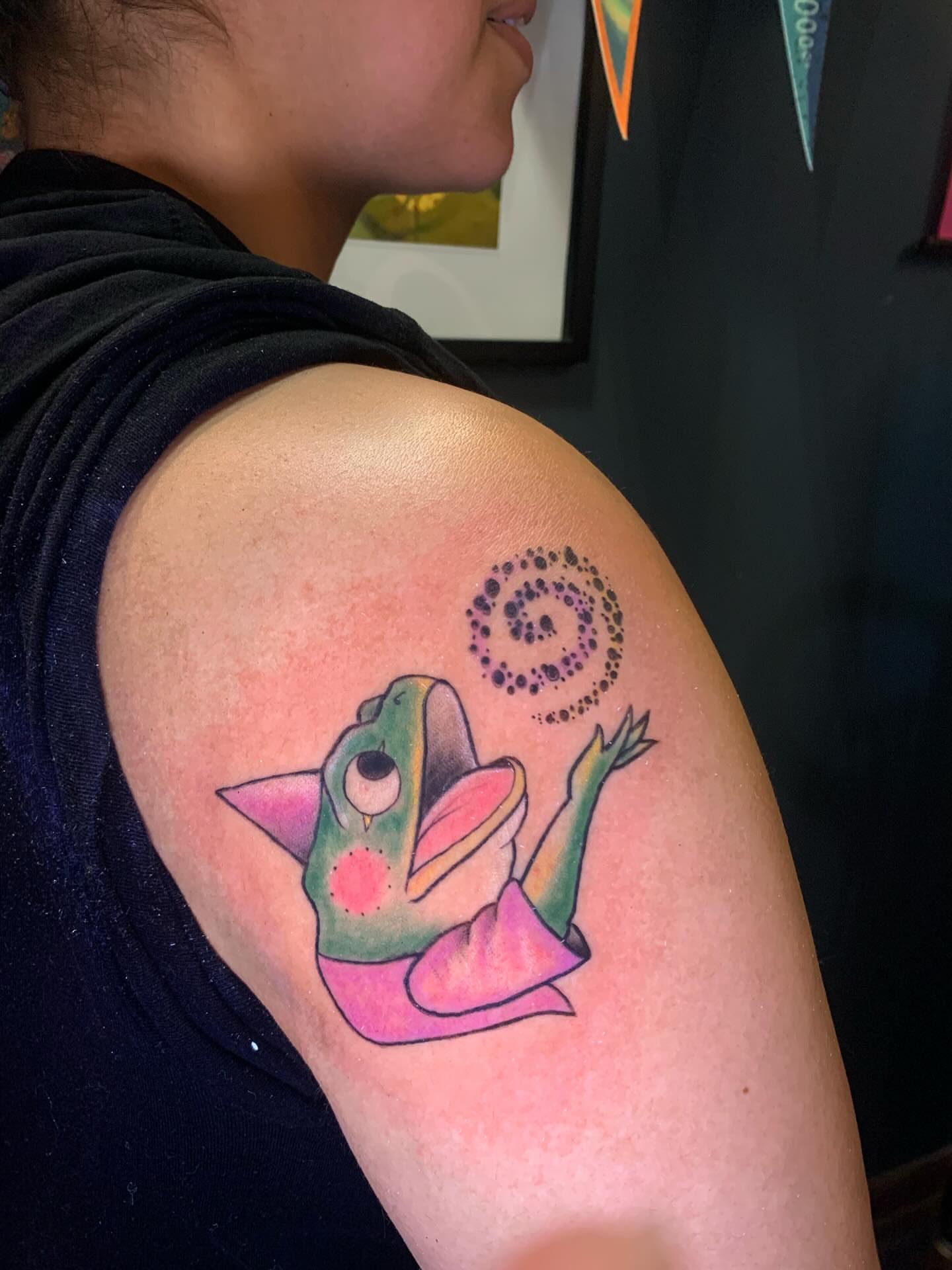 Frog dotwork tattoo on the shoulder by Hannah Hahn