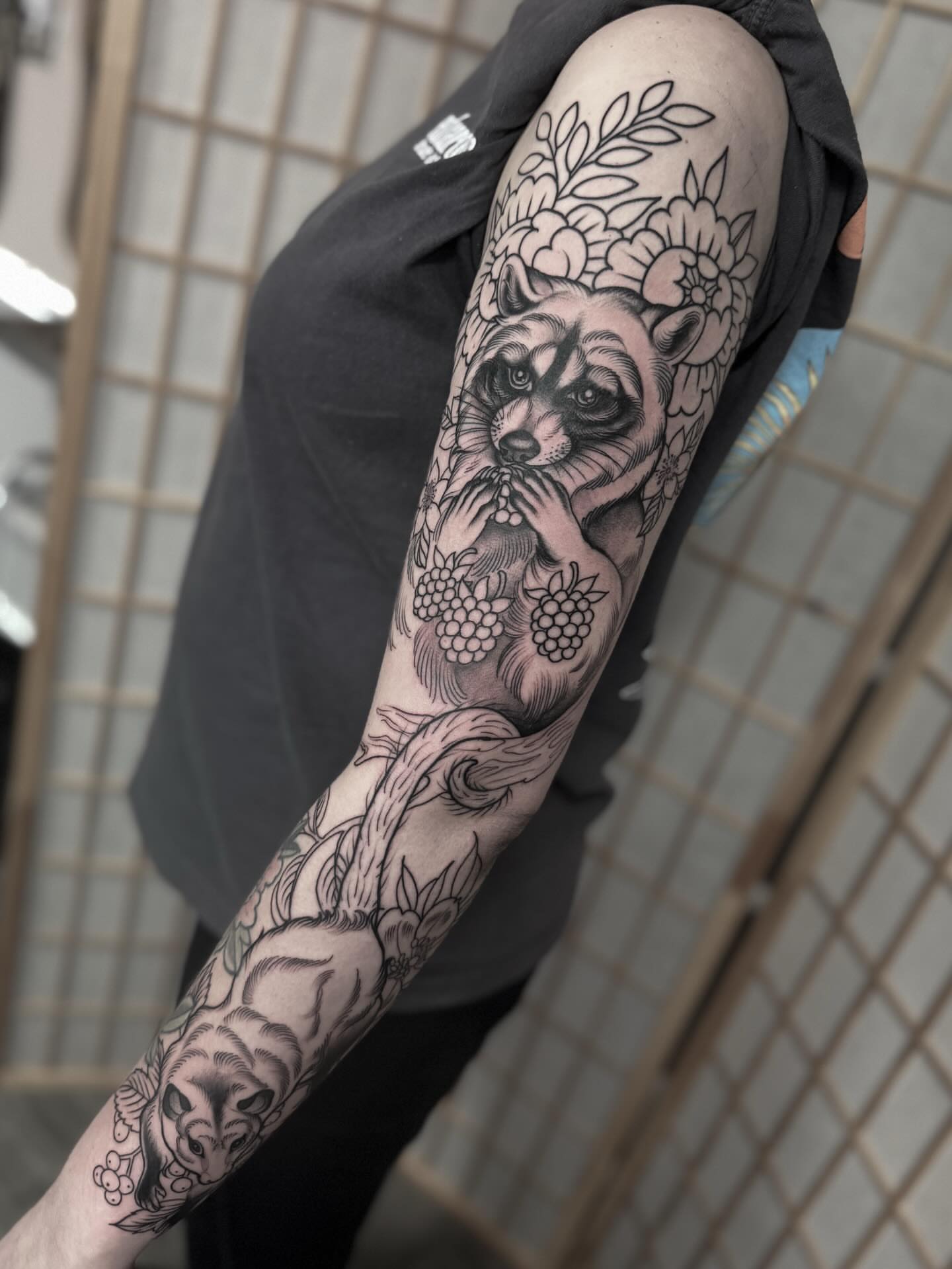 Raccoon and berries realism tattoo on the forearm by ⚔️ 𝕬𝖓𝖞𝖆 𝖁𝖎𝖈𝖙𝖔𝖗𝖎𝖆 ⚔️, Fairfax, Virginia