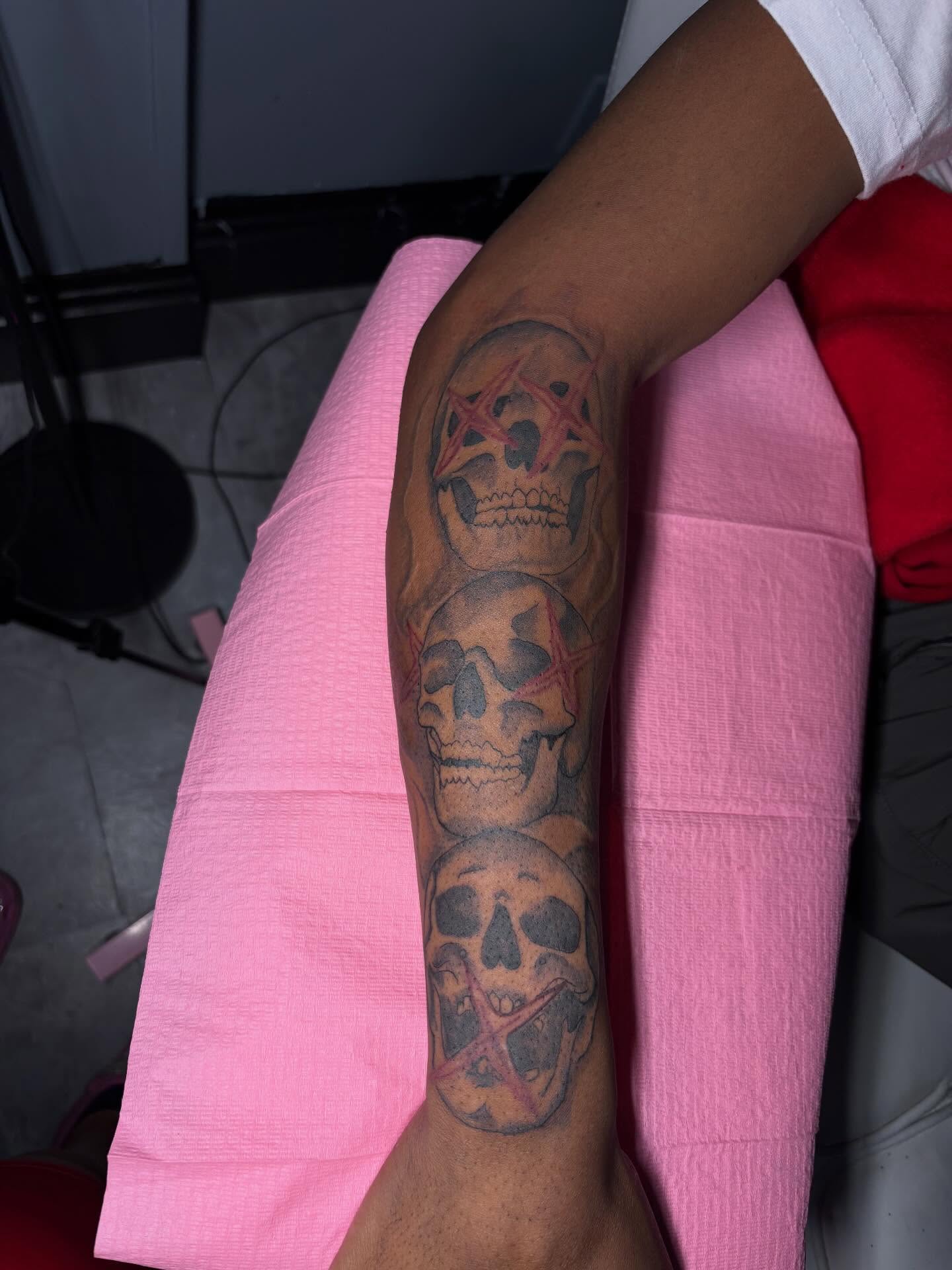 Skulls with pentagrams black and grey tattoo on the forearm by addicted222inkk🎨