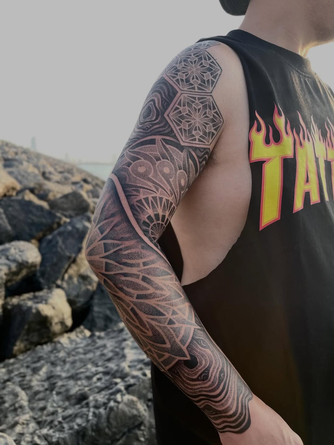 Tattoo by @russellefandialan — geometric, dotwork