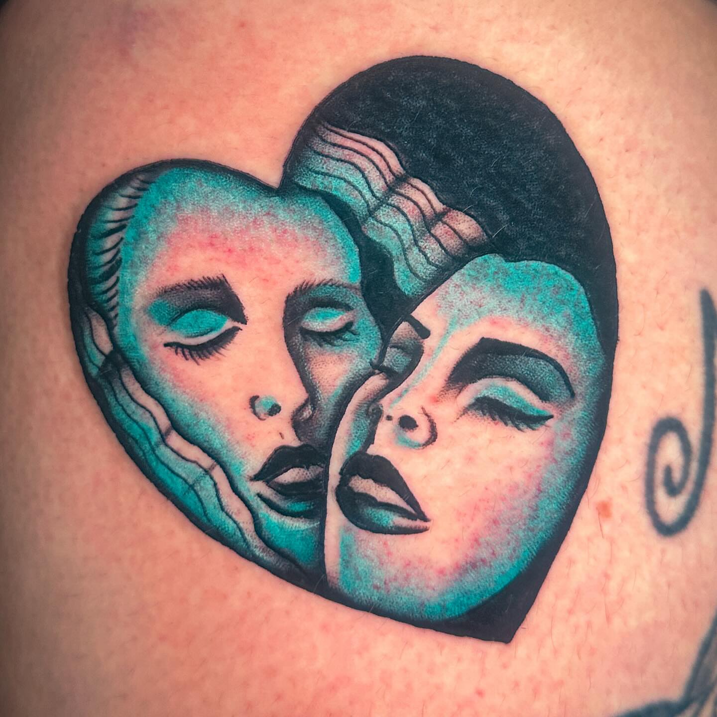 Heart with faces geometric tattoo on the thigh by Stacey Colangelo