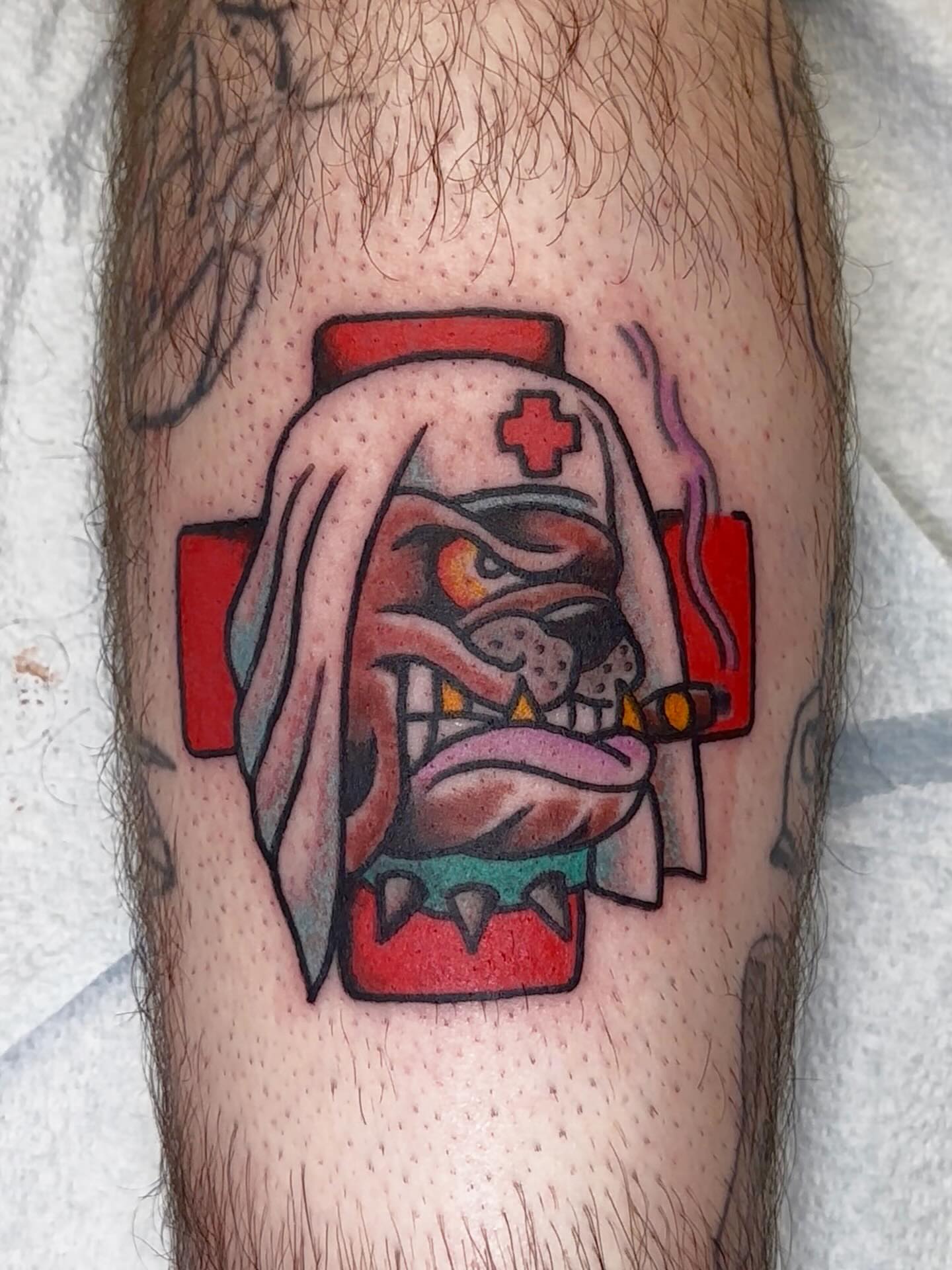 Angry nurse mask American traditional tattoo on the forearm by Olive Kelley