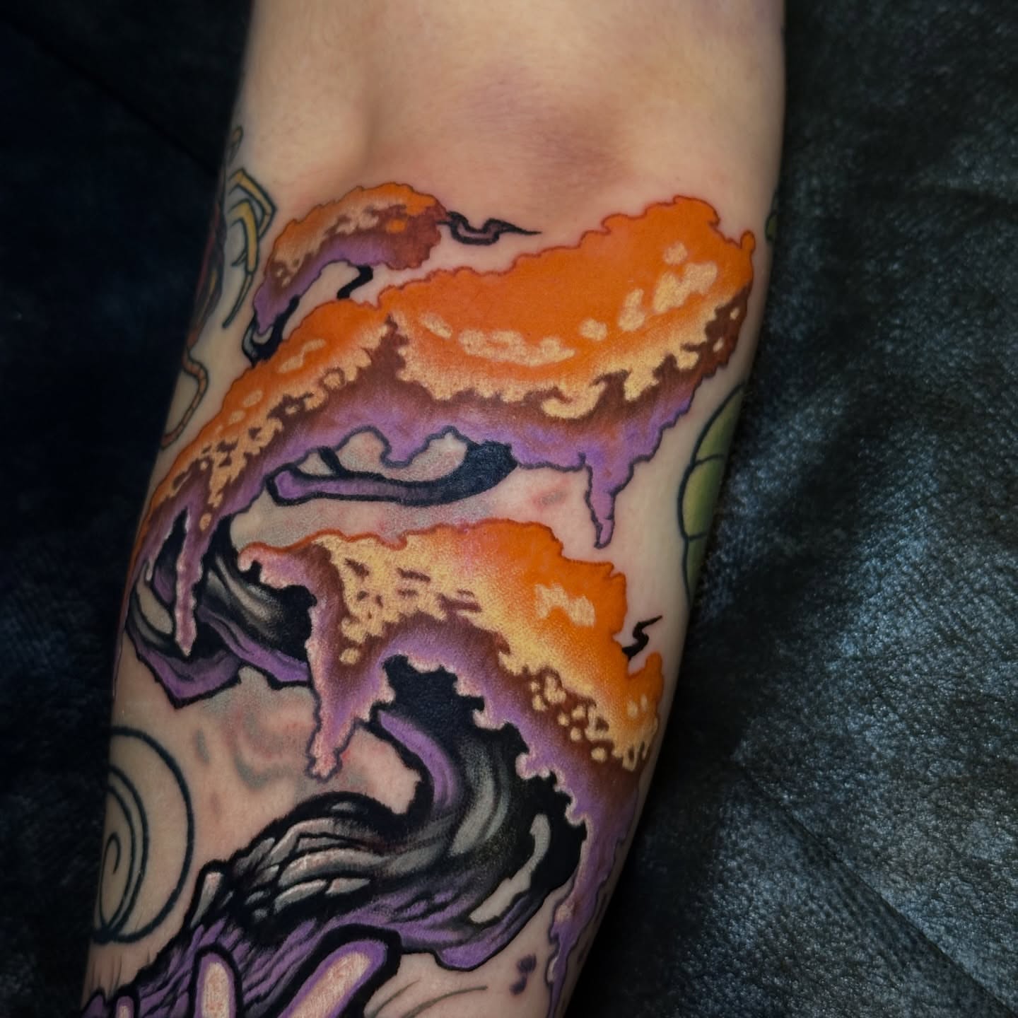 Wave new school tattoo on the forearm by Skylar Mangrum