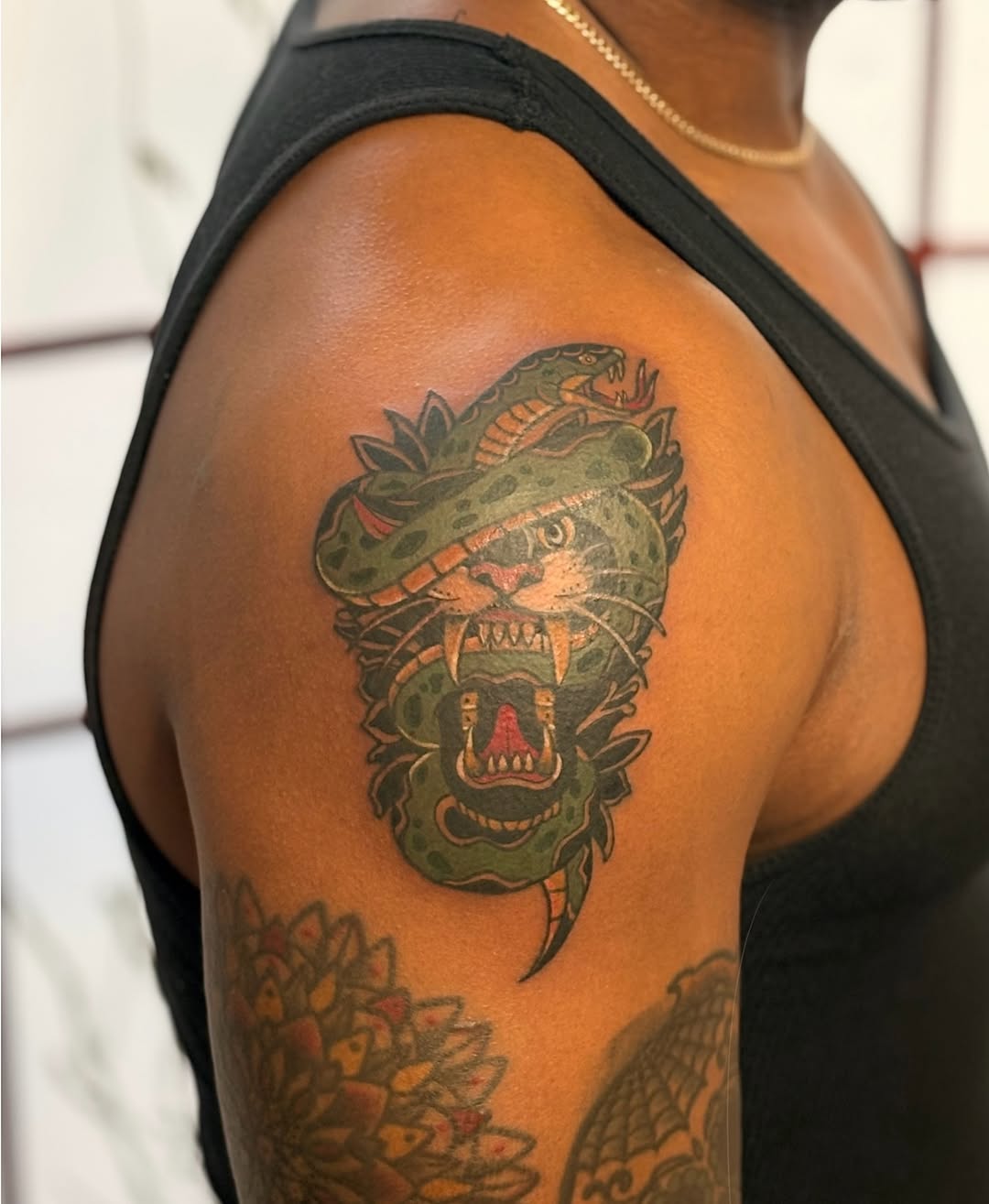 Snake and cat realism tattoo on the shoulder by CJ