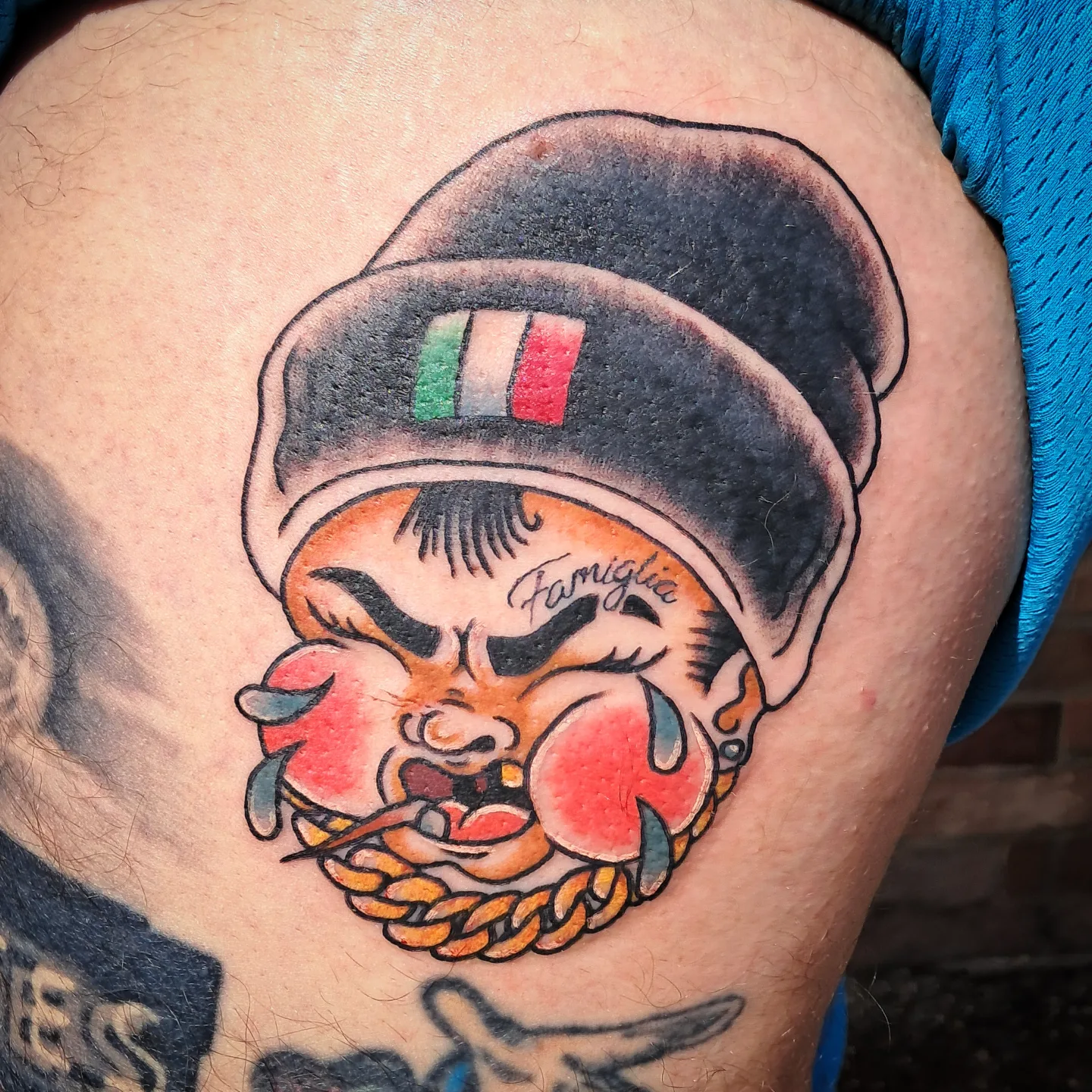 Cartoon character American traditional tattoo on the thigh by Erika Hollingsworth