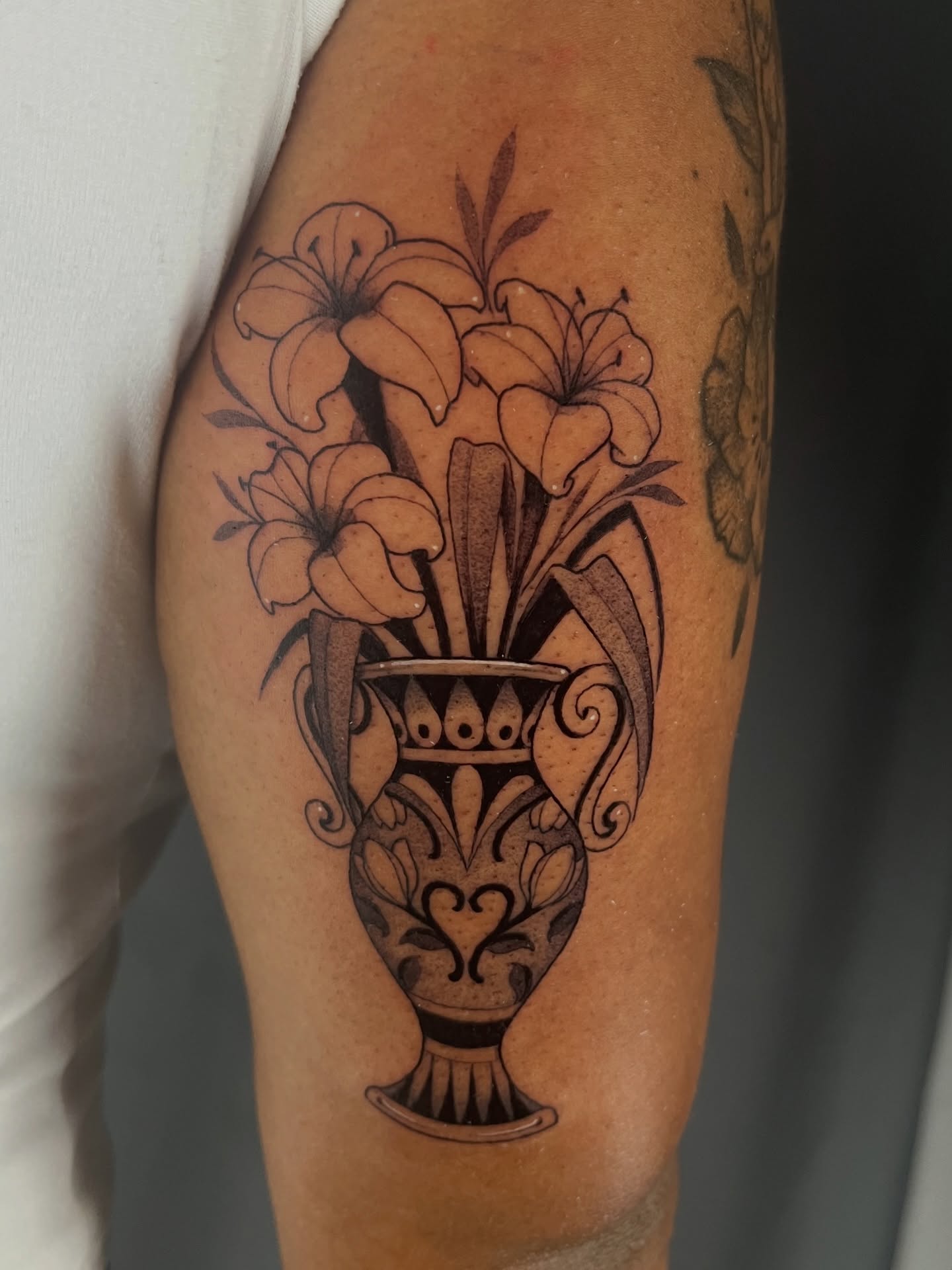 Flowers in vase black and grey tattoo on the forearm by Odi ✮⋆˙, Las Vegas, Nevada