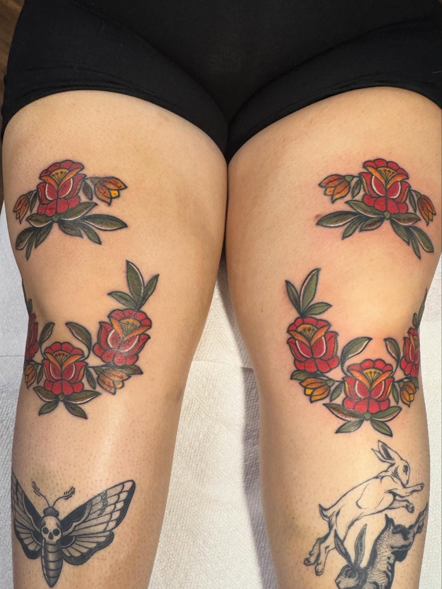 Floral wreath American traditional tattoo on the thigh by ️️️️️Hannah Smyle