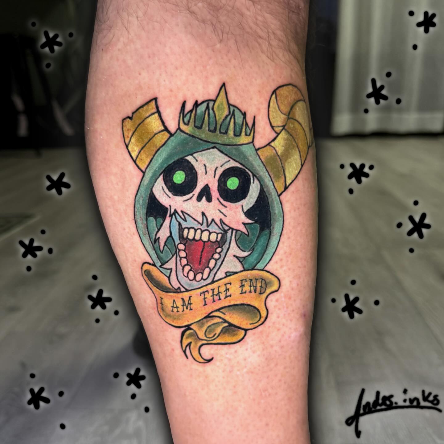 Skull with crown American traditional tattoo on the forearm by ande