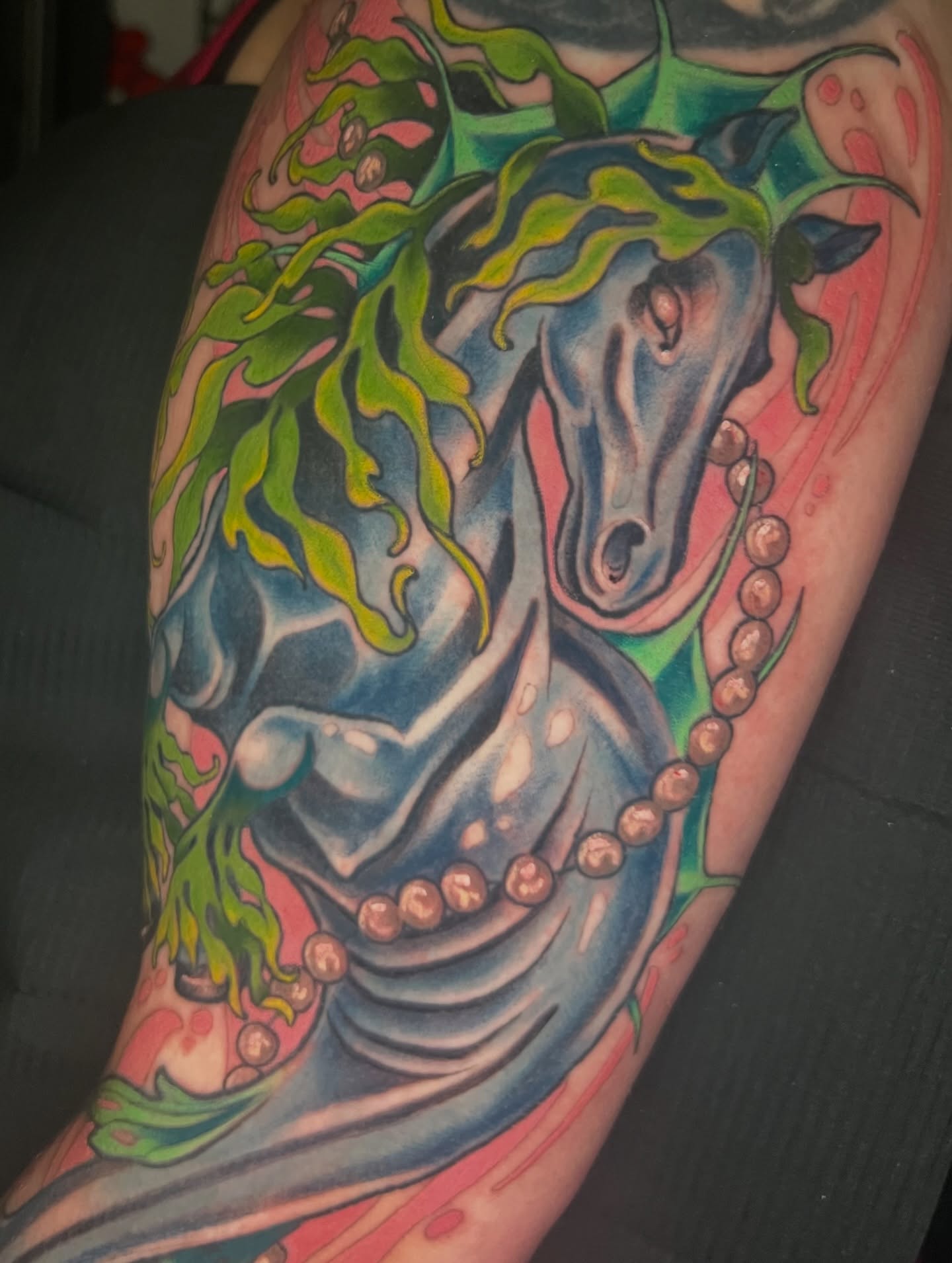 Horse new school tattoo on the forearm by Belle Halverson