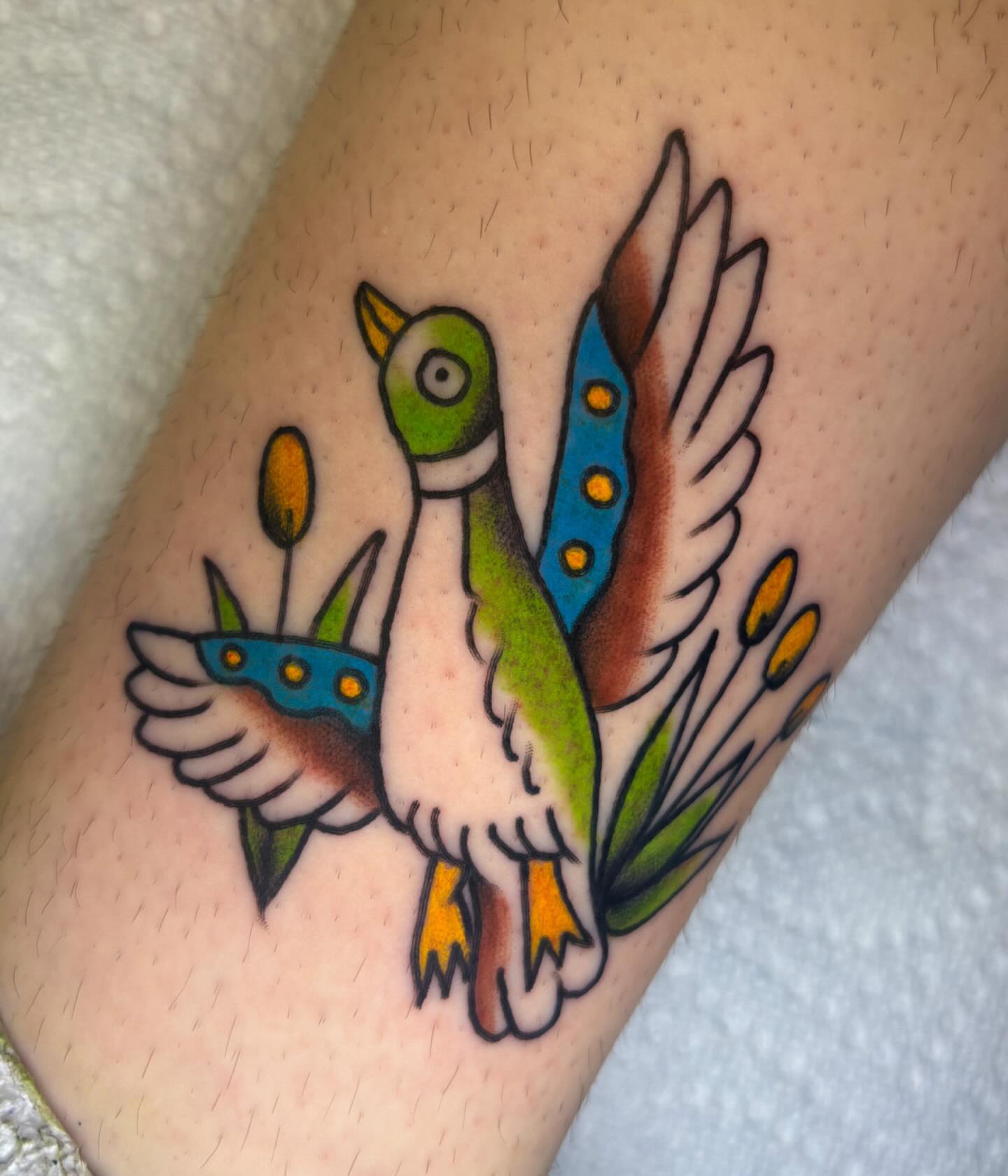 Ducks American traditional tattoo on the forearm by Katelyn Spence