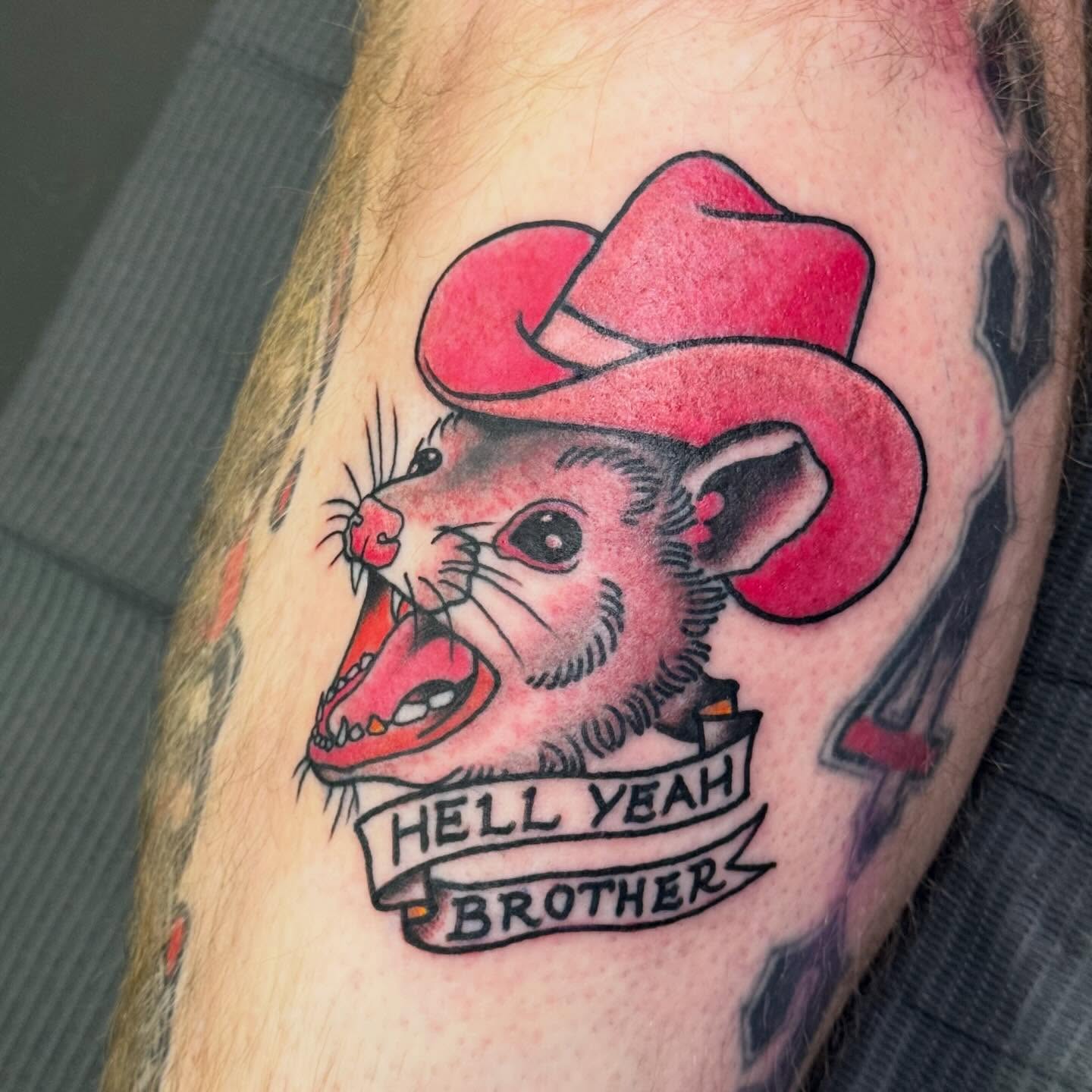 Mouse wearing cowboy hat American traditional tattoo on the forearm by Jack Hatchet Tattoos
