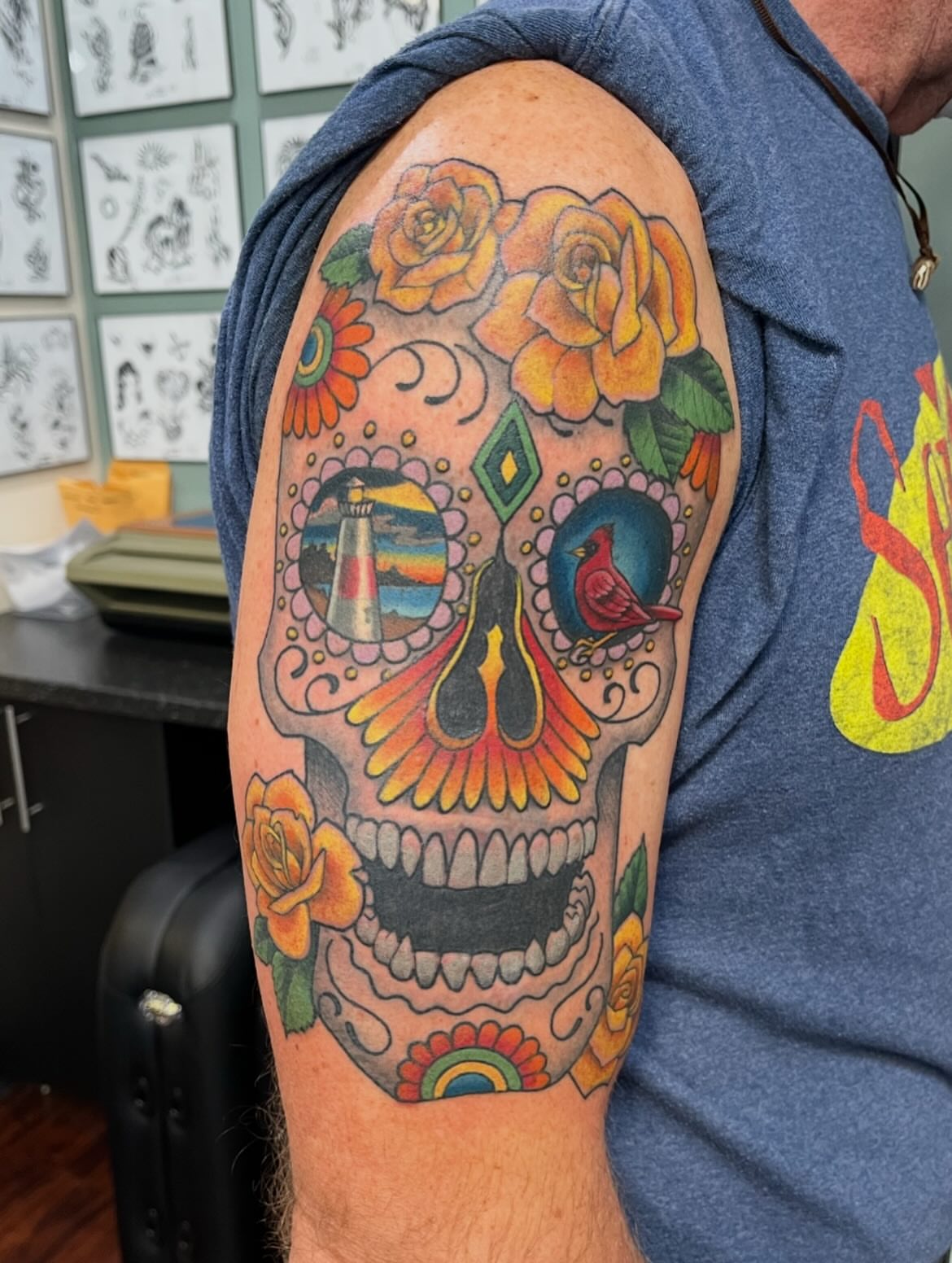 Sugar skull Chicano tattoo on the upper arm by Miles Maniaci, Chicago, Illinois